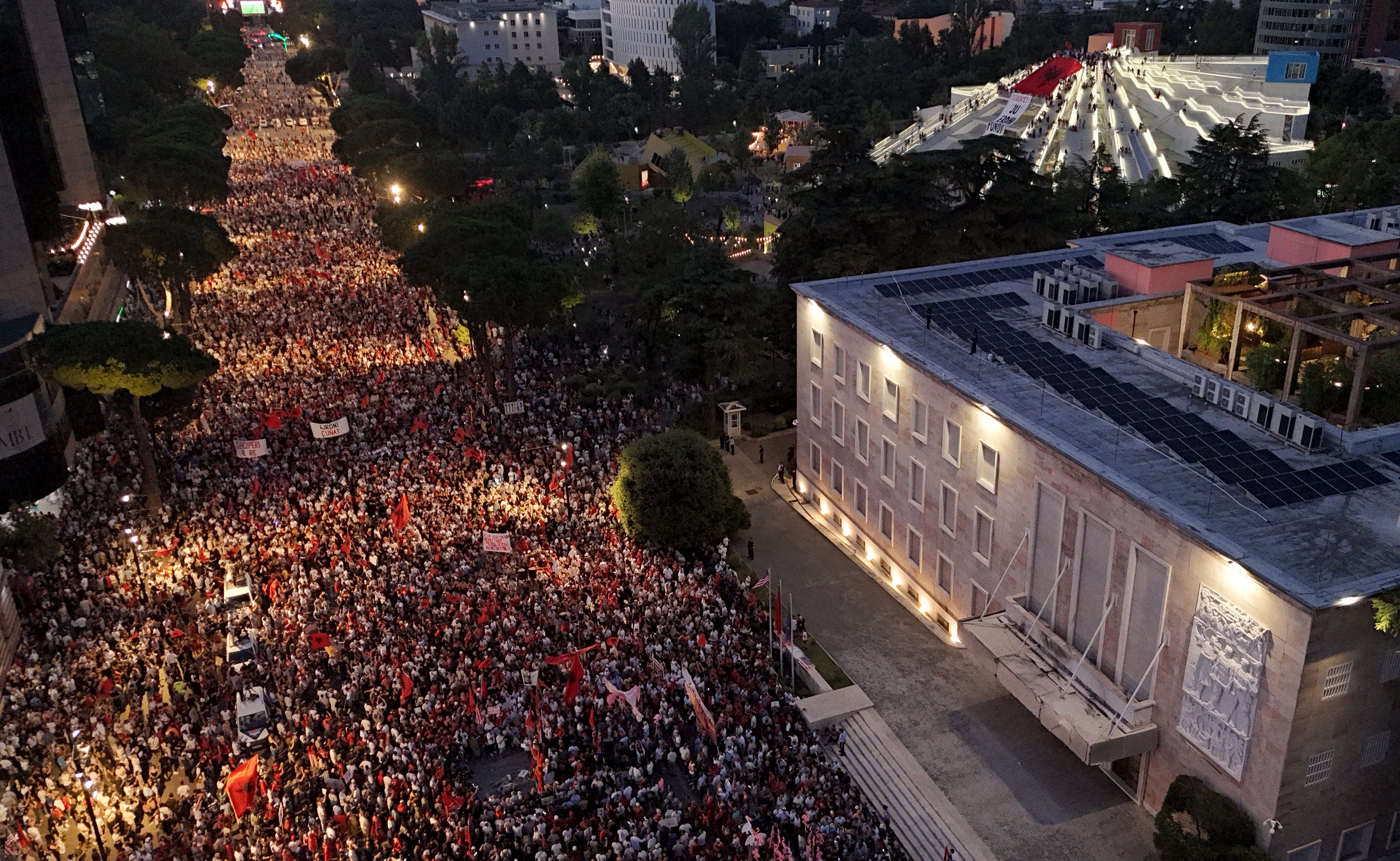 Protesters demonstrate in front of the Albanian Prime Minister's Office against the construction of a luxury resort