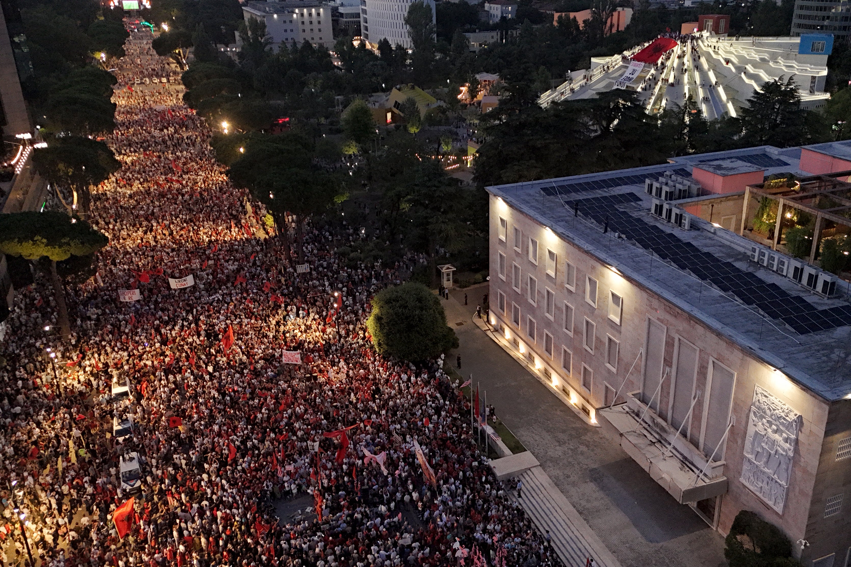 Protesters demonstrate in front of the Albanian Prime Minister's Office against the construction of a luxury resort (AFP/Getty)