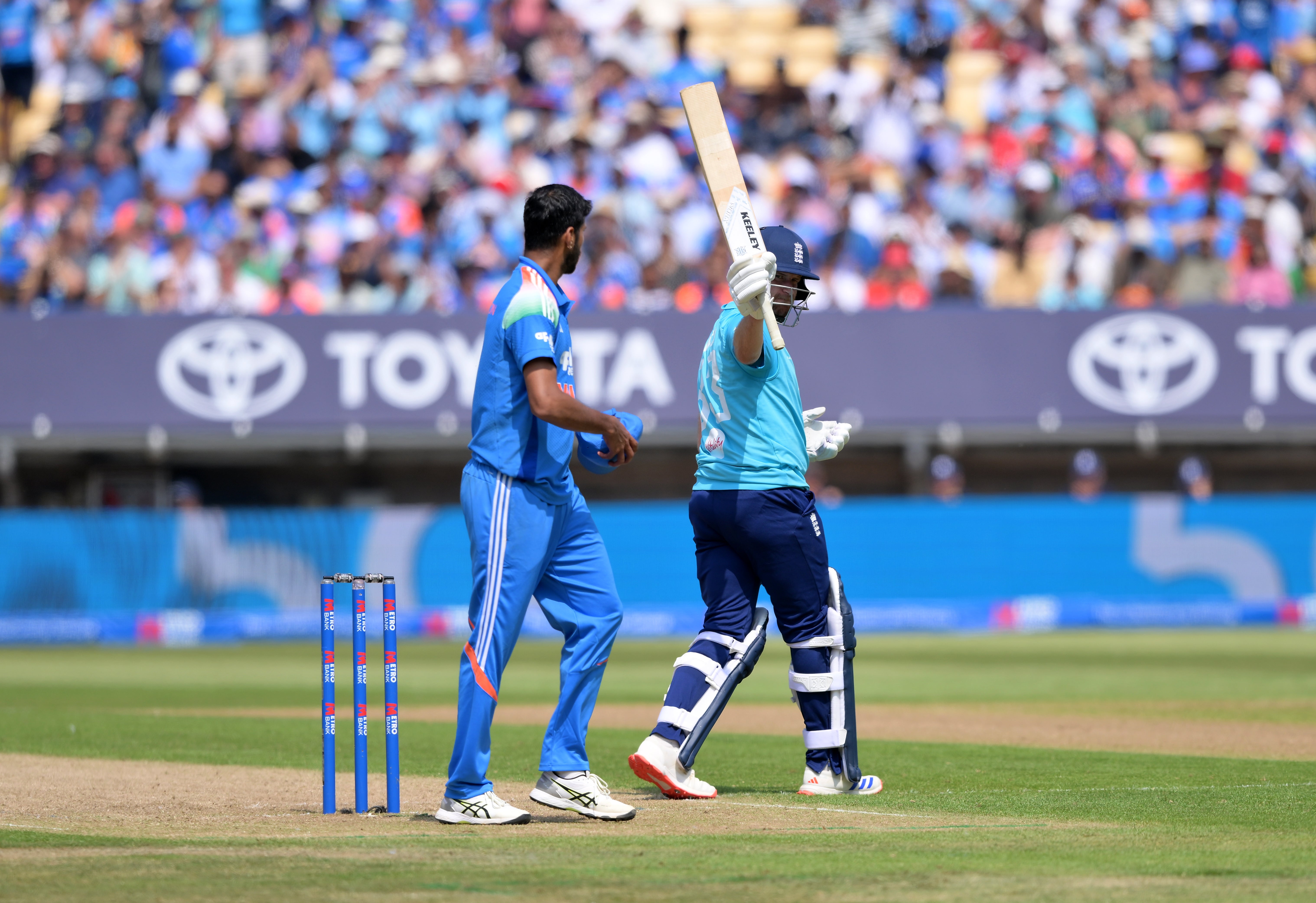 Liam Dawson celebrates his half-century against India. (Gary Oakley/PA) (PA Wire)
