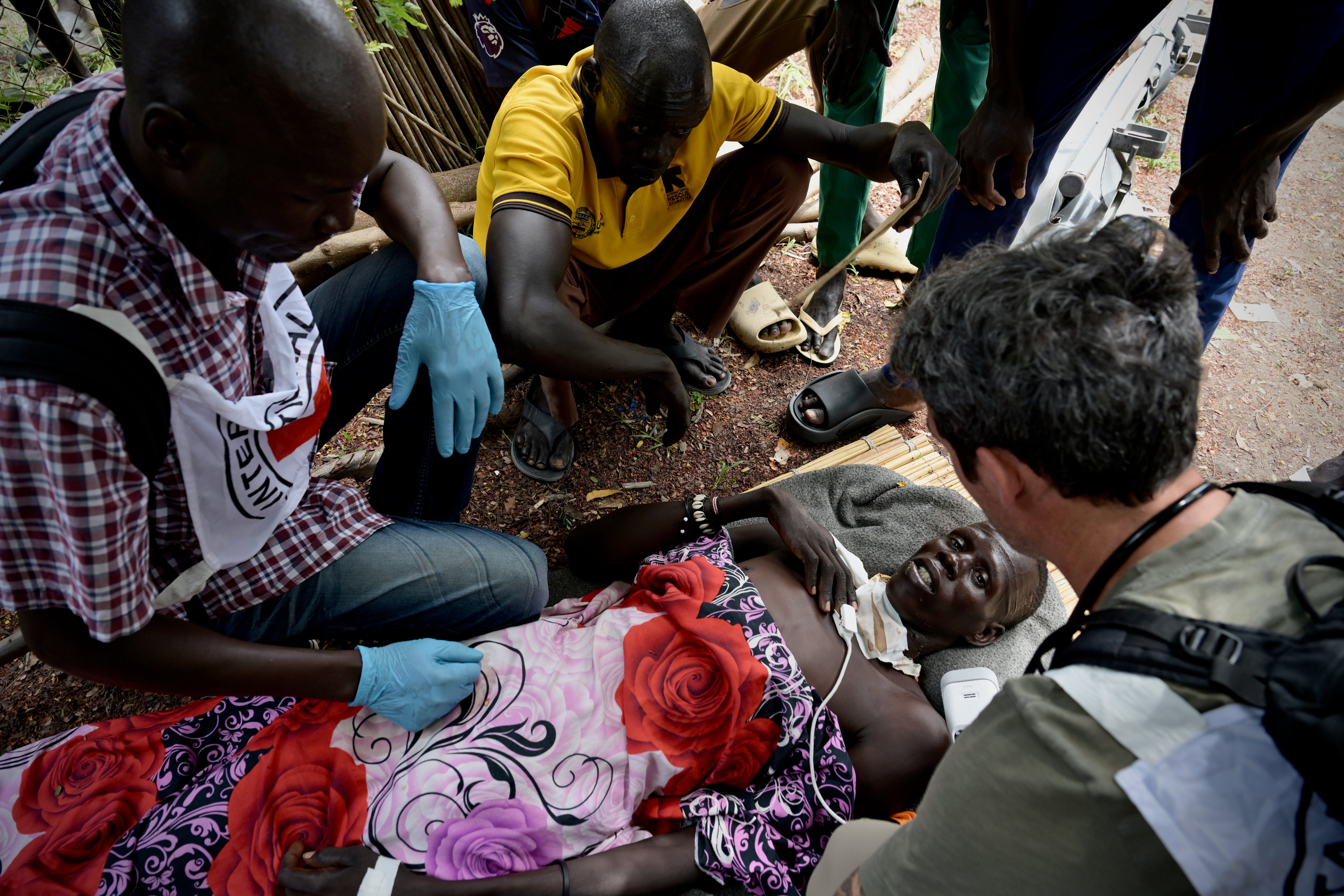 A wounded patient receives treatment in South Sudan.