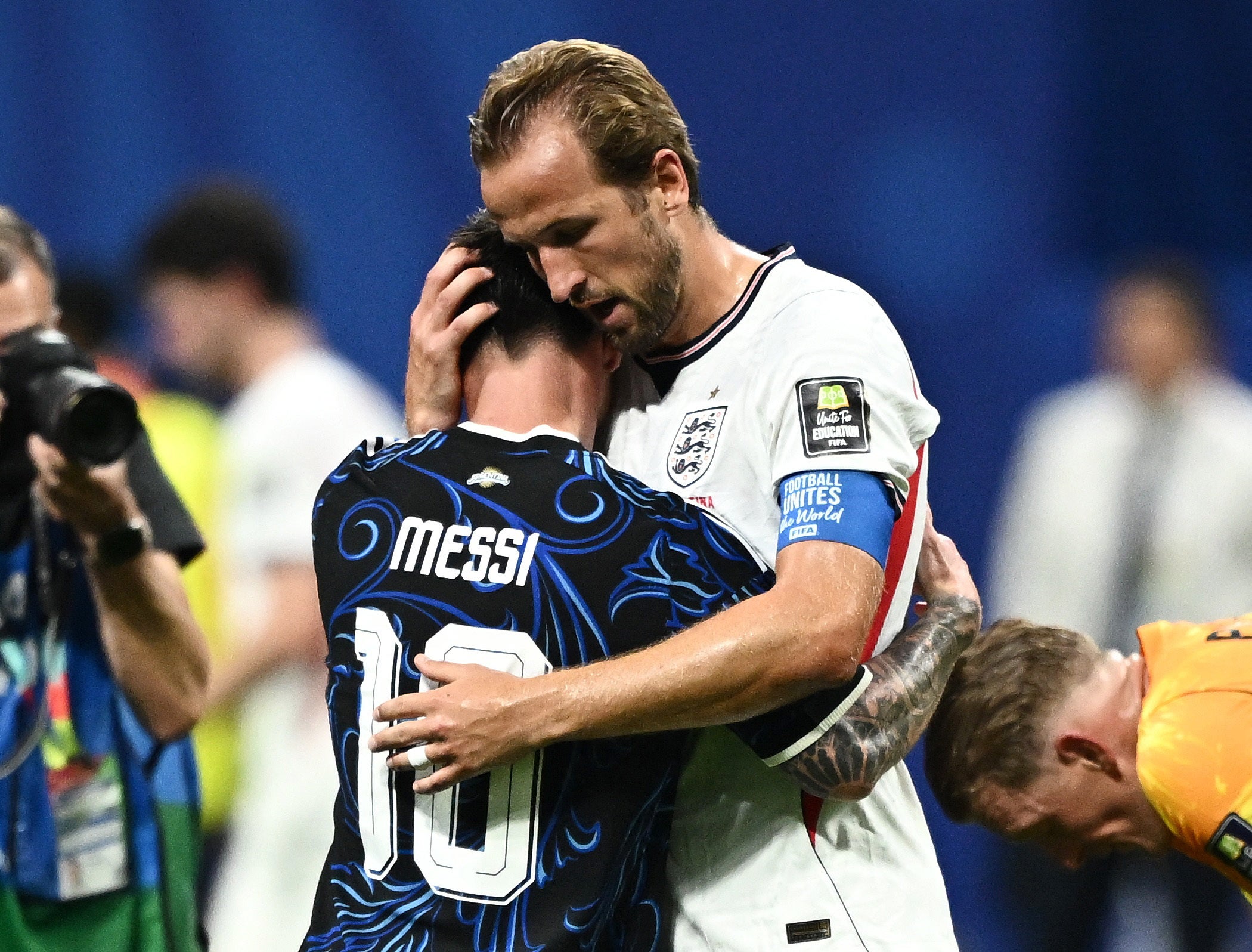 Argentina's Lionel Messi hugged England's Harry Kane at the end of the match