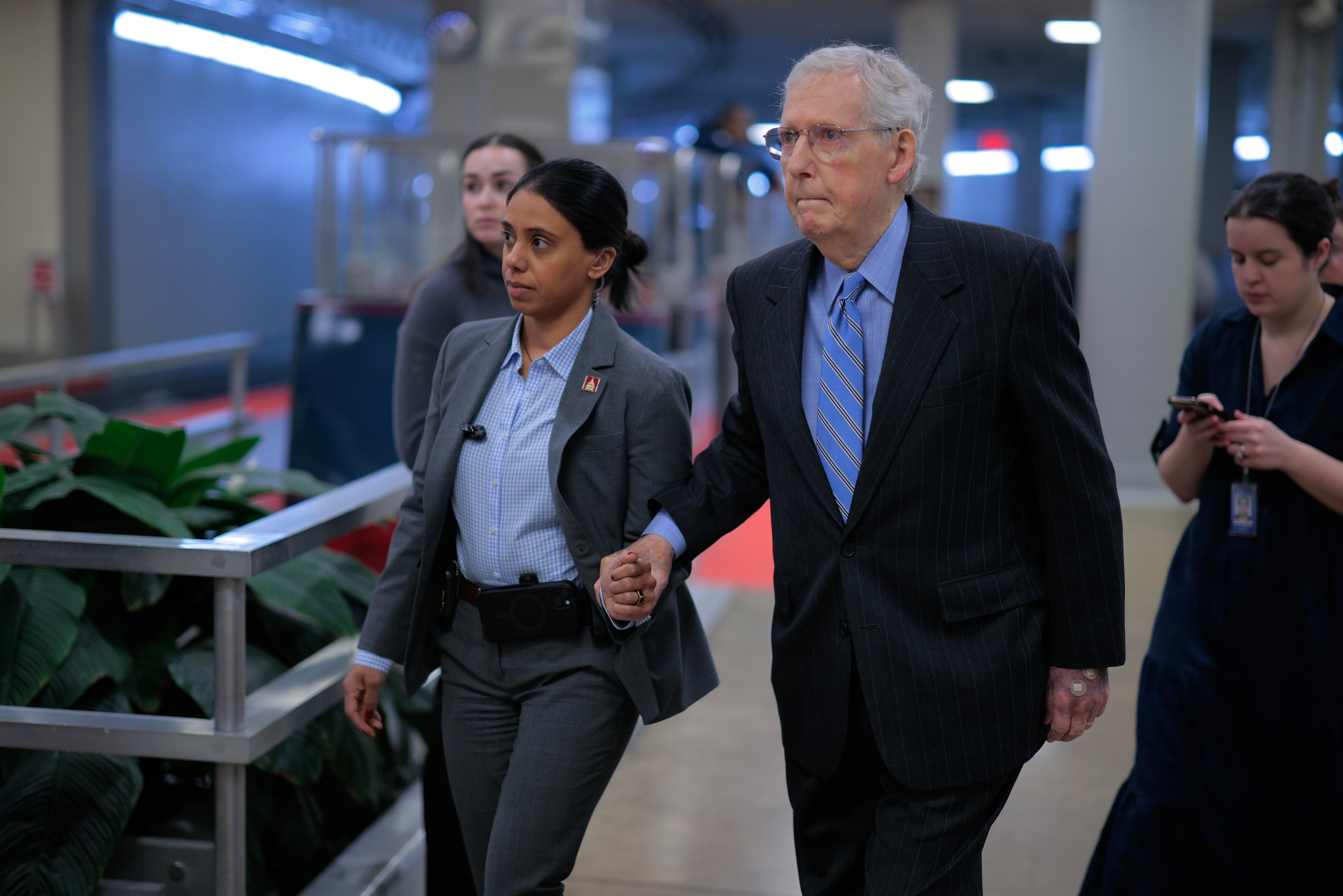 Conspiracy theorists have baselessly speculated that McConnell has died and that his team is covering it up, while the senator says he is recovering from a fall (Getty Images)