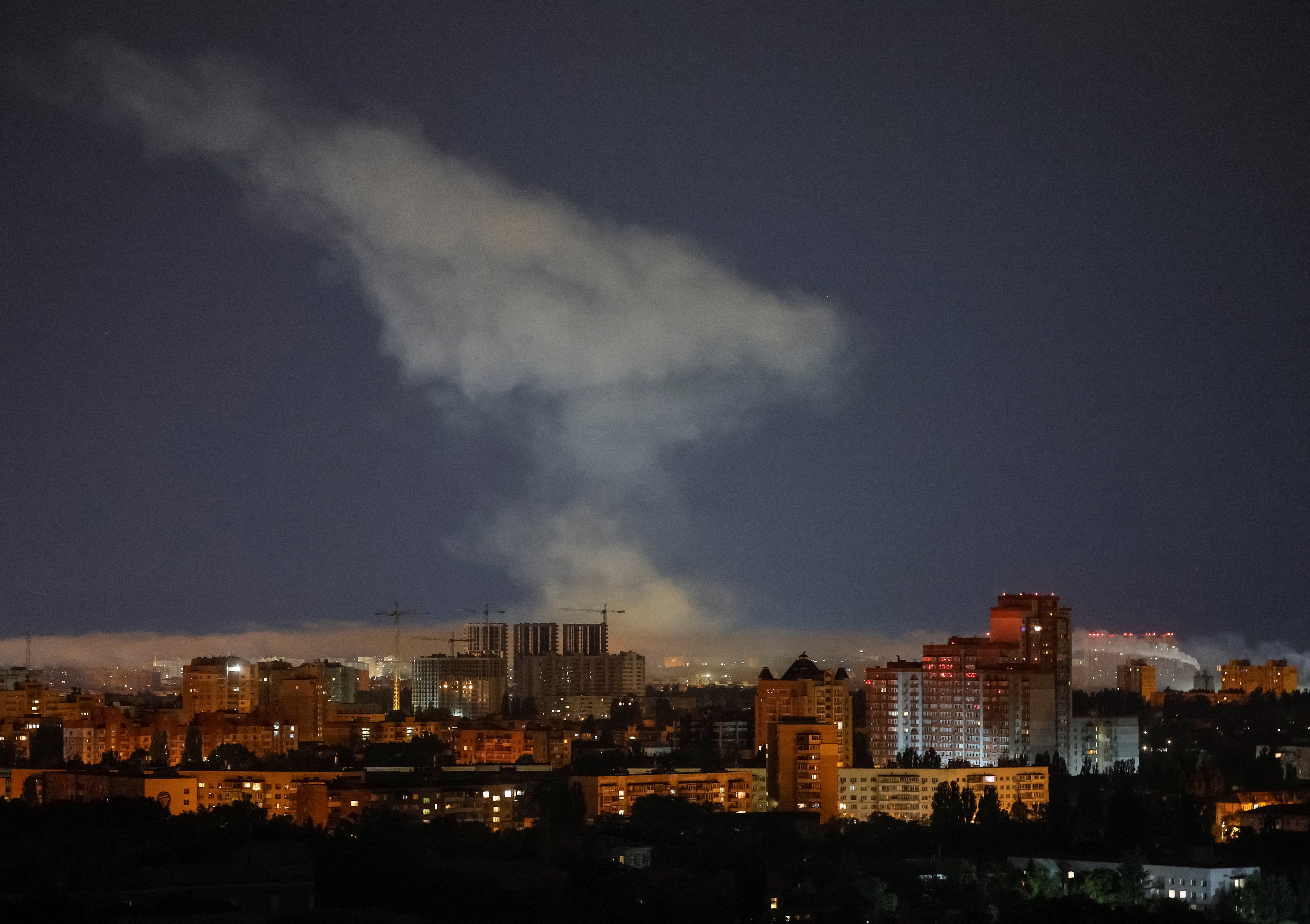 Smoke rises in the city during a Russian missile strike (Reuters)