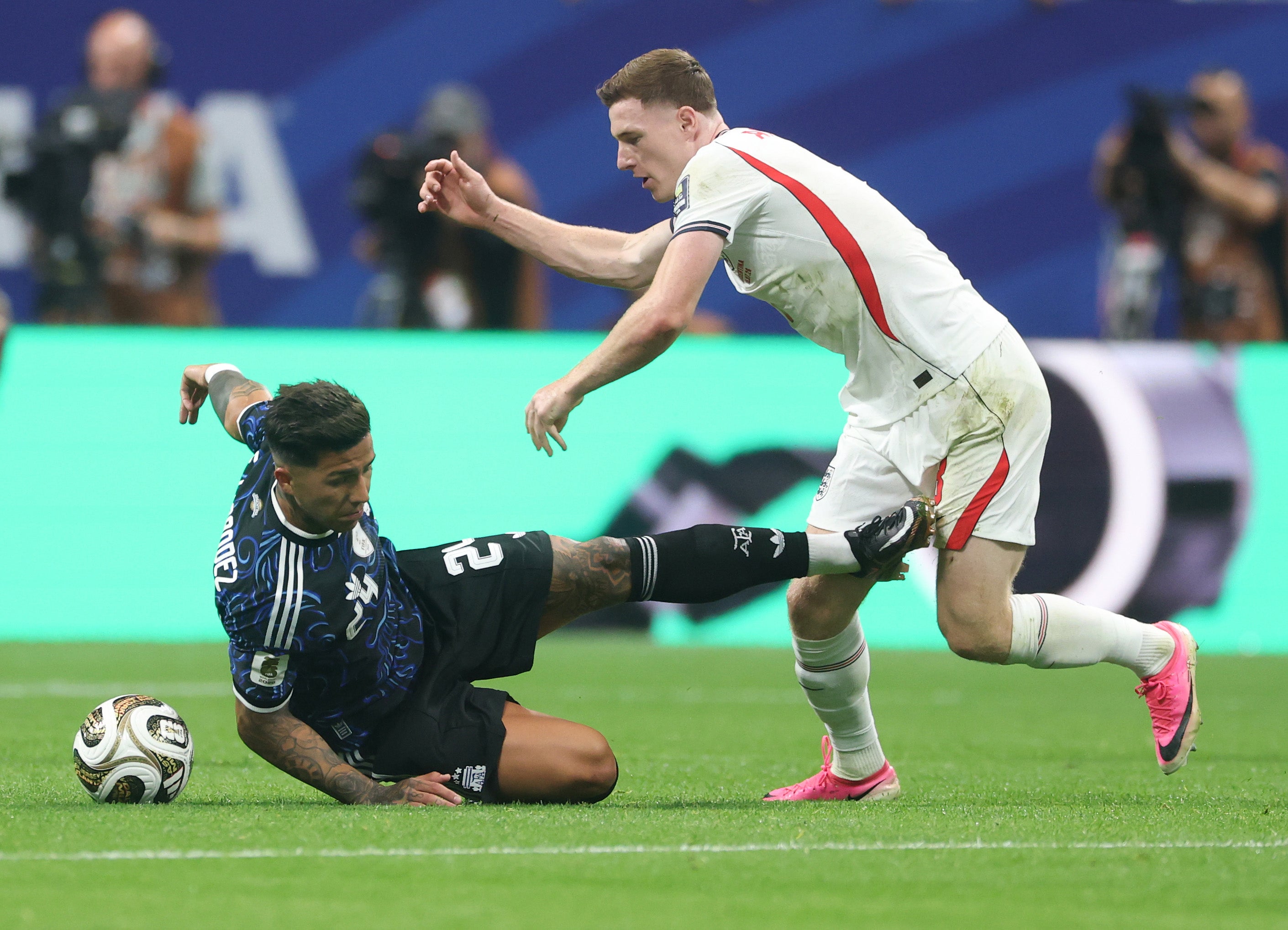 Enzo Fernandez #24 of Argentina and Elliot Anderson #8 of England during the FIFA World Cup 2026 Semi Final match between England and Argentina at Atlanta Stadium on 15 July 2026 in Atlanta, Georgia