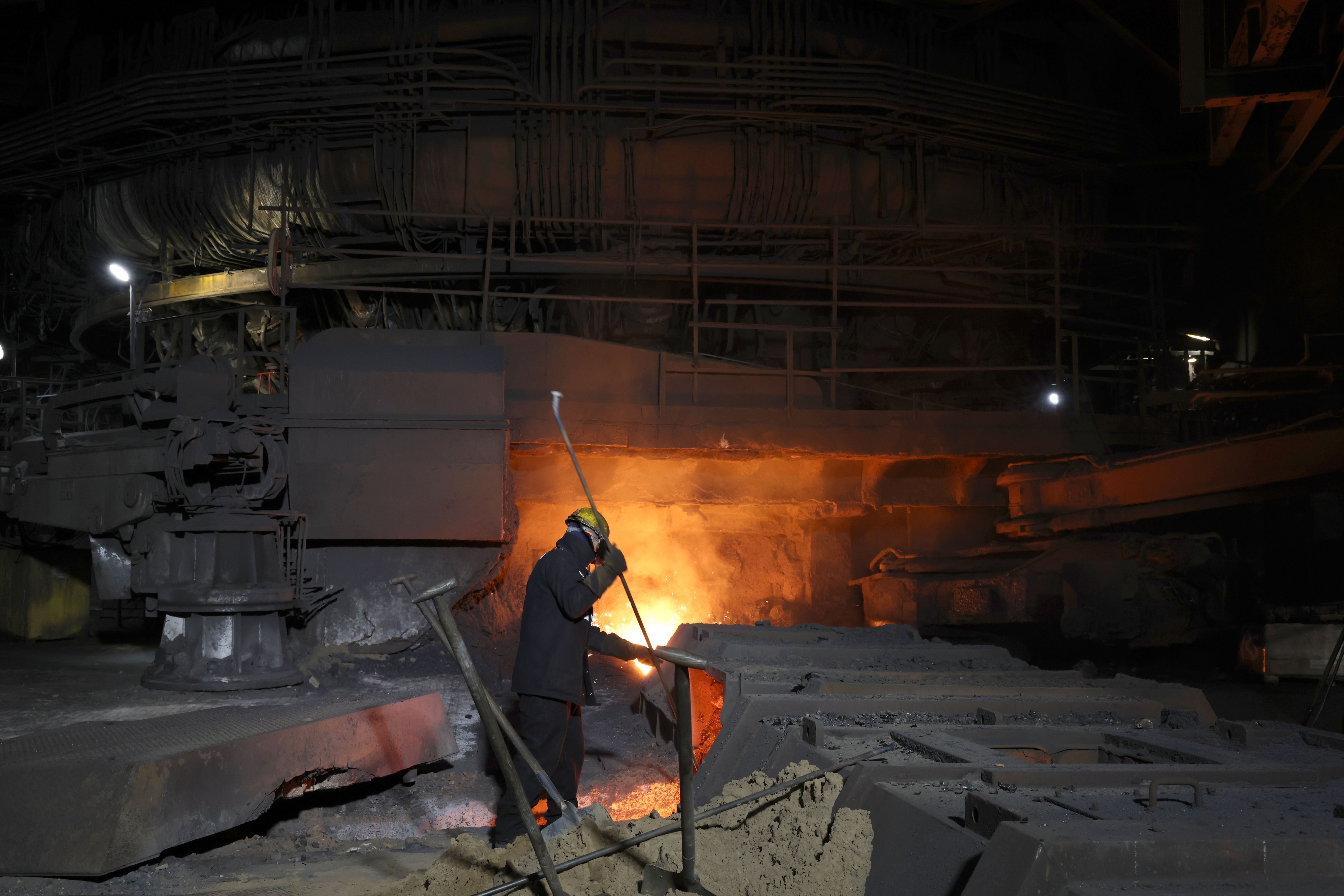 A steel worker at one of the blast furnaces at the British Steel site in Scunthorpe, Lincolnshire (Darren Staples/PA)
