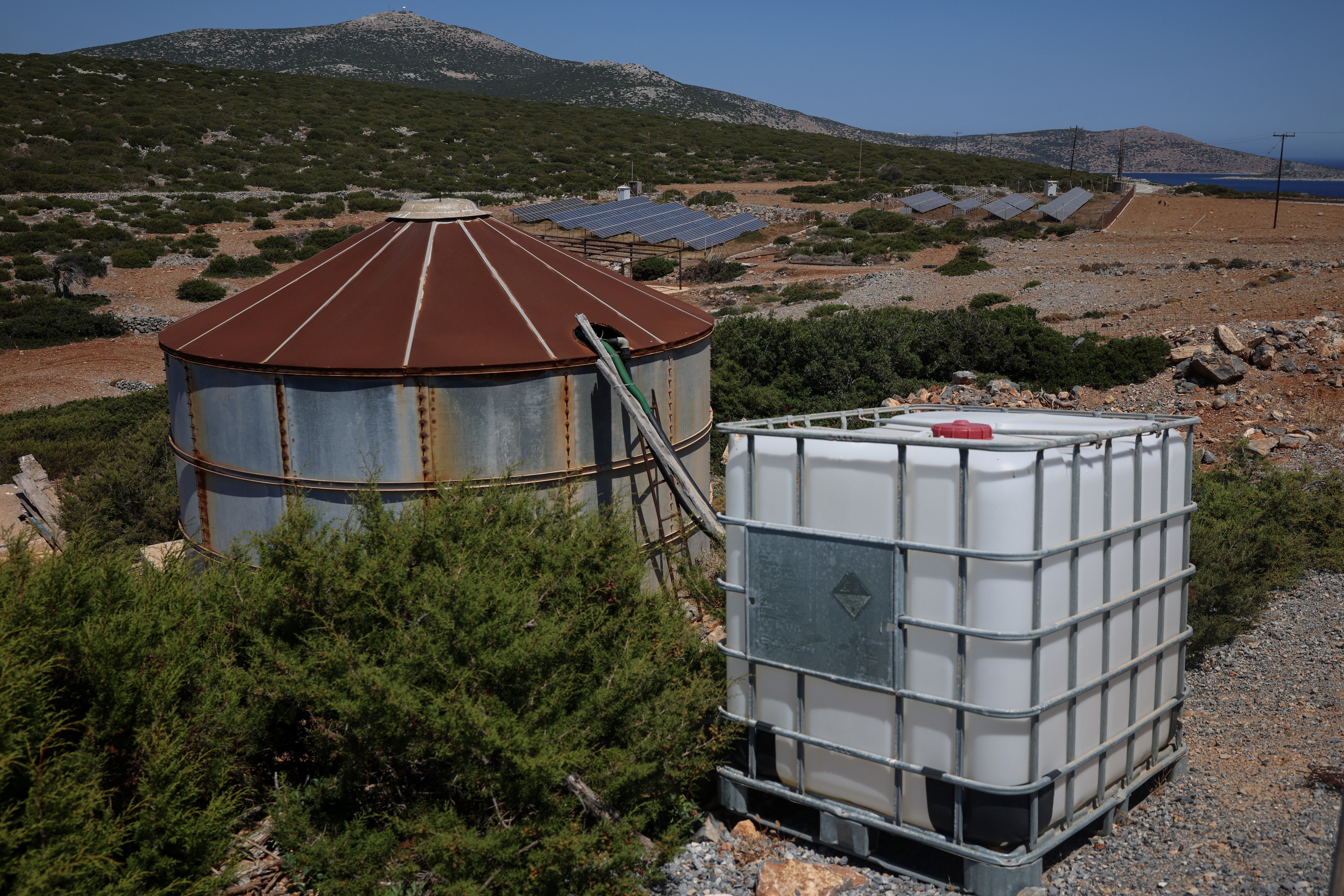 Water tanks near the village of Analipsi, on the island of Astypalaia, Greece, which has declared a drought emergency, July 13, 2026