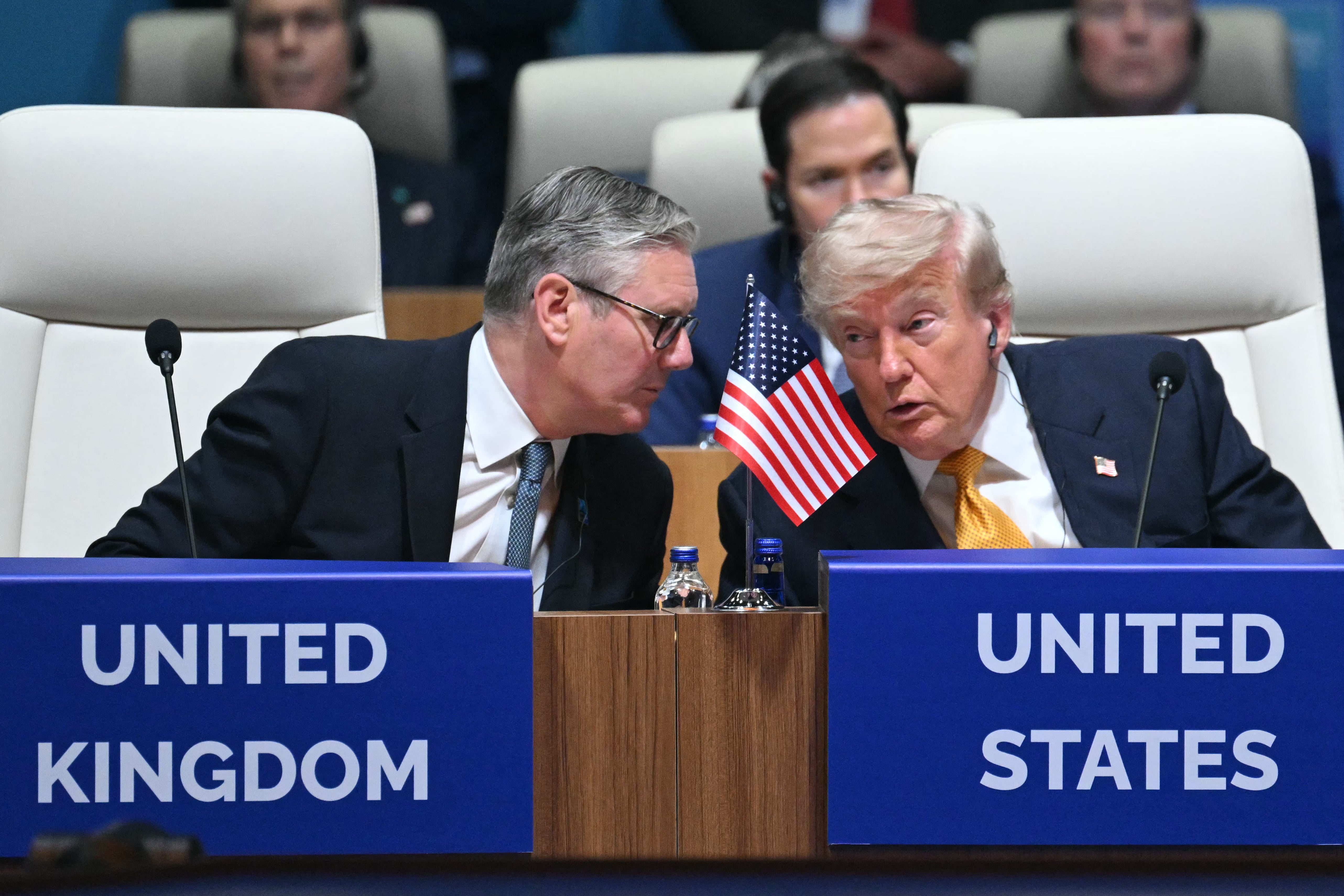 The United Kingdom saw a dramatic decline in the percentage of respondents who viewed the United States favorably. (Pictured left: British PM Keir Starmer. Pictured right: President Trump)
