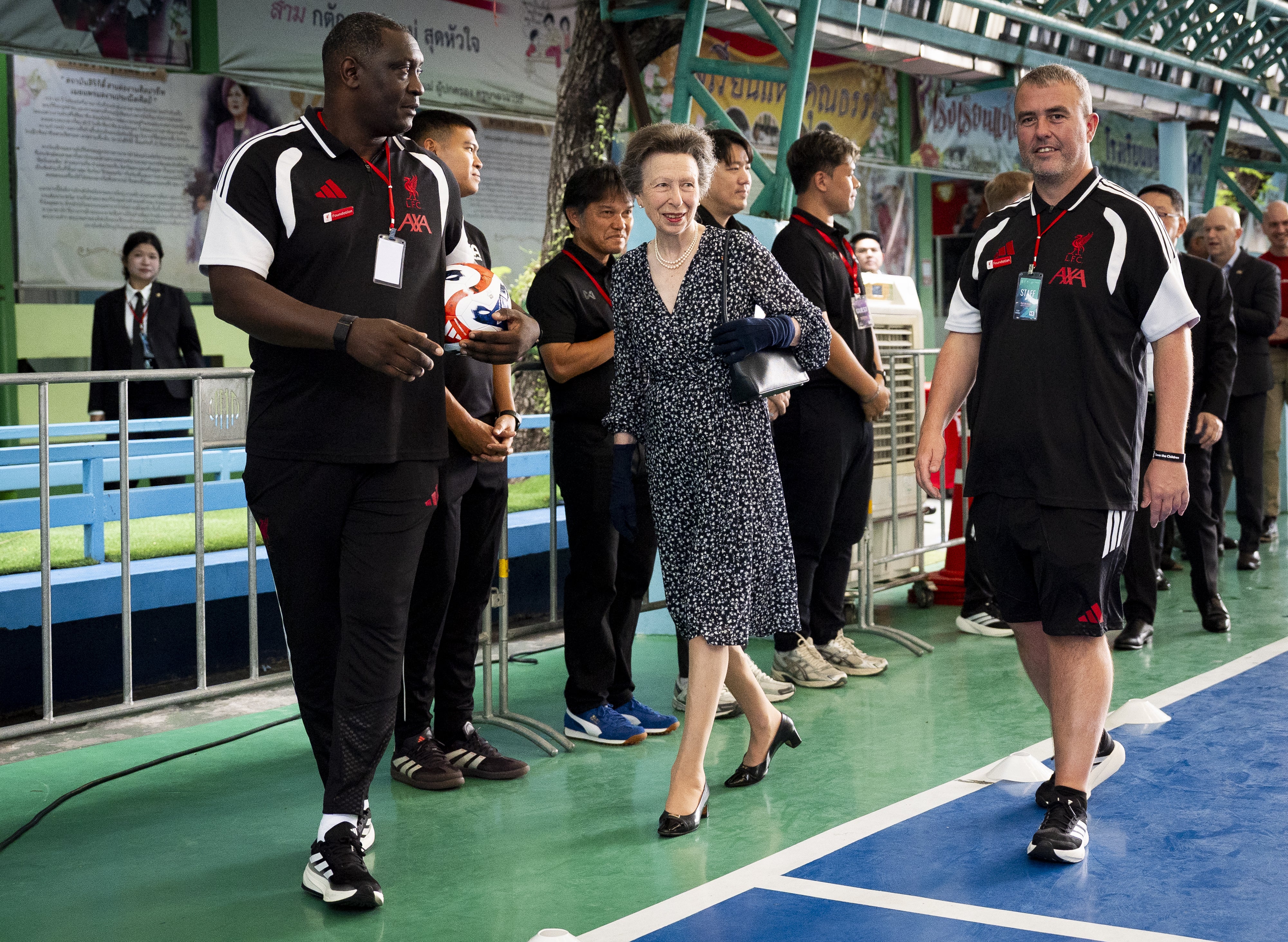 Anne meets former footballer and representative of Liverpool Football International Academy Emile Heskey during a Play For Change event in Bangkok (PA Wire)