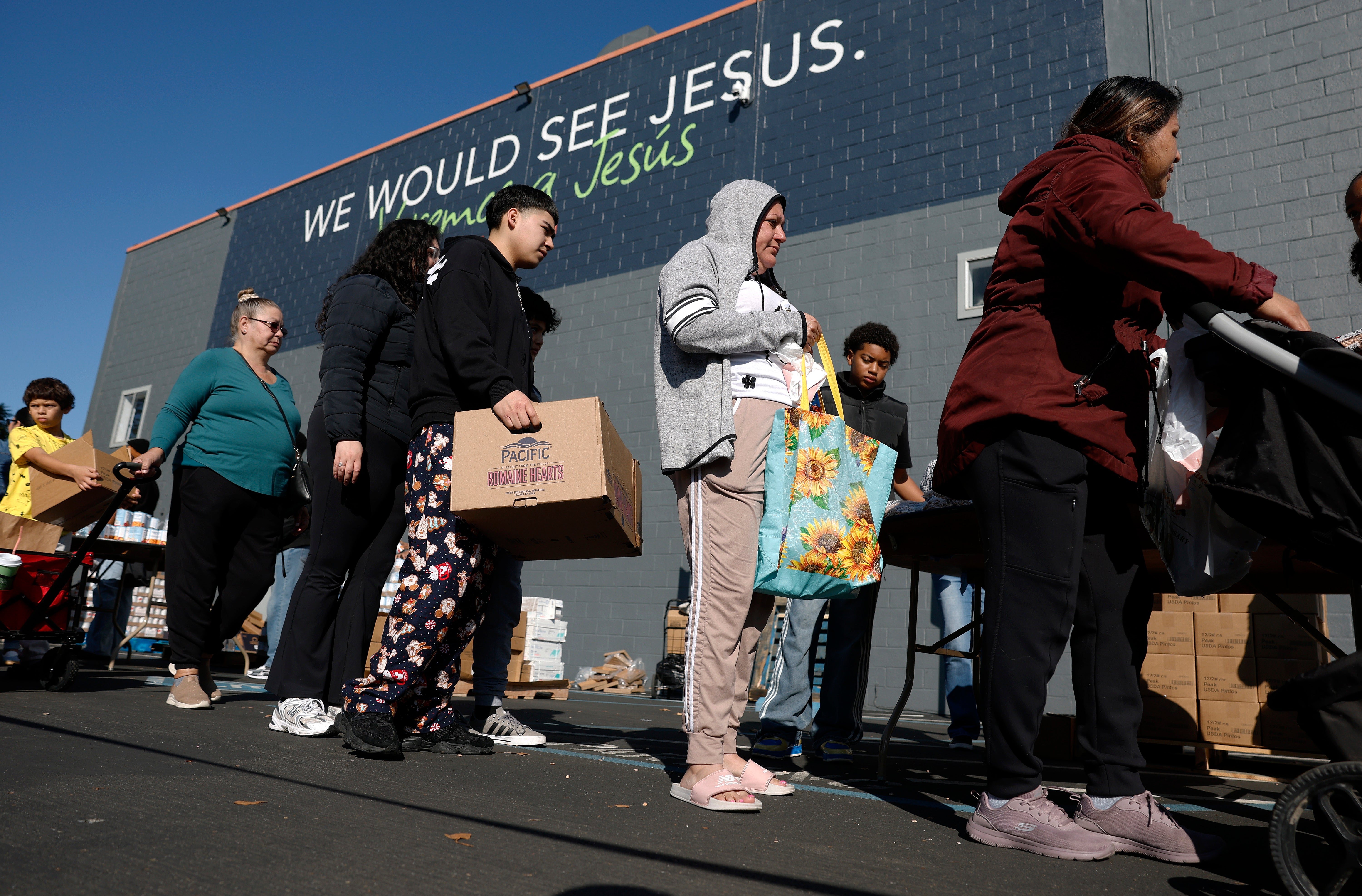 Trump revives rule that could deny green cards to migrants using food stamps and Medicaid
