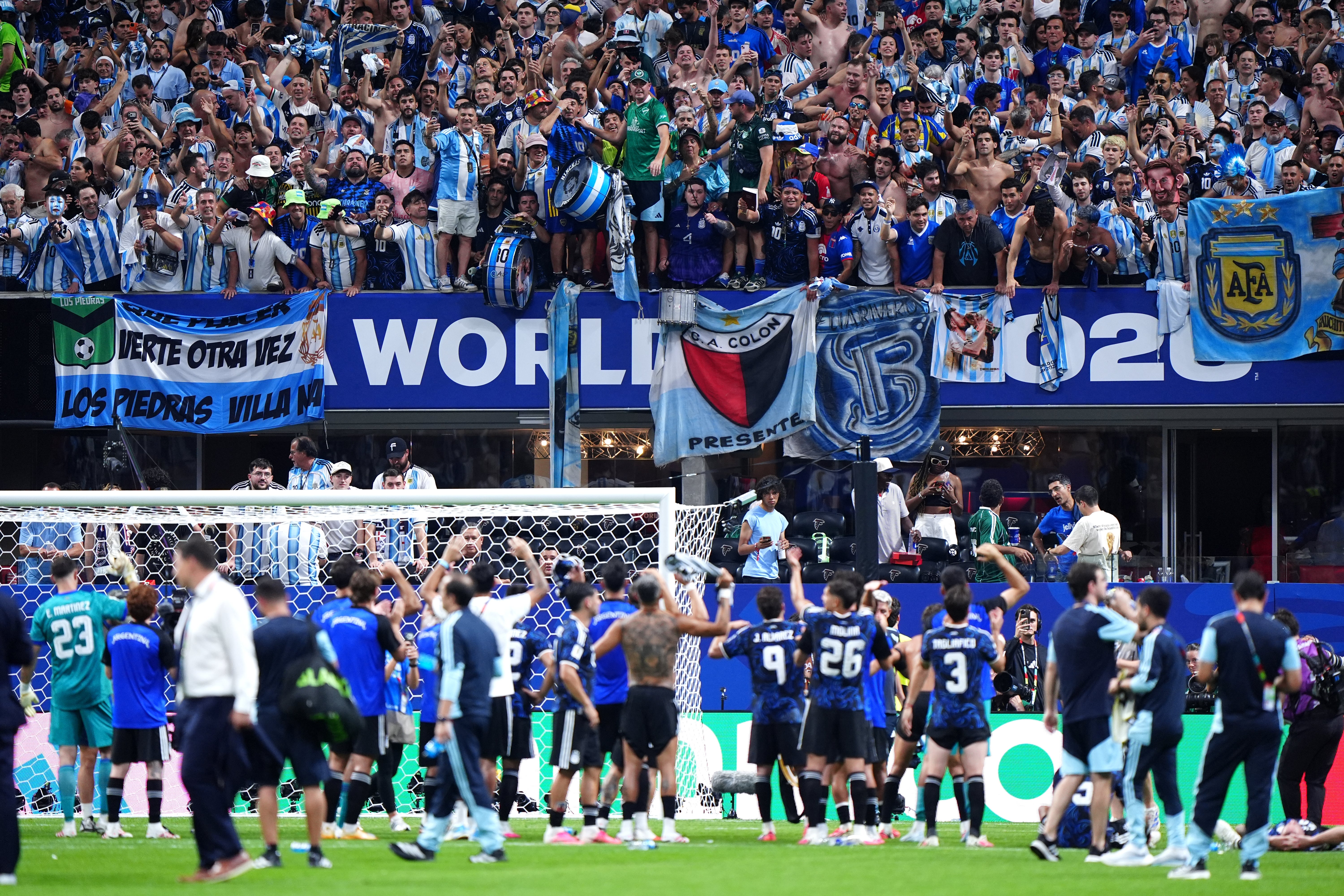 Argentina players celebrate with their fans following the semi-final win (Bradley Collyer/PA)