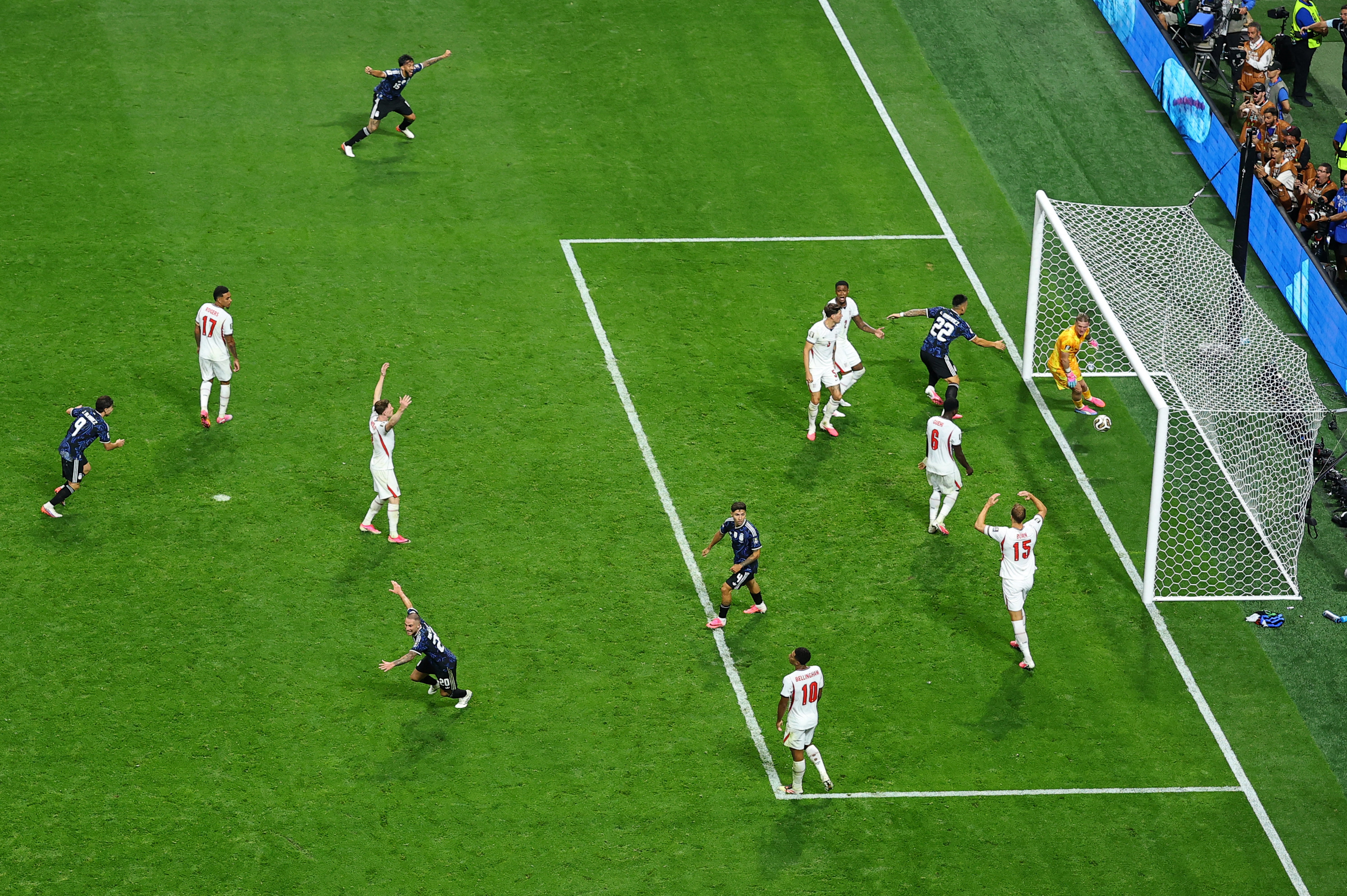 Argentina's Lautaro Martinez celebrates scoring their second goal after England dropped off and invited pressure