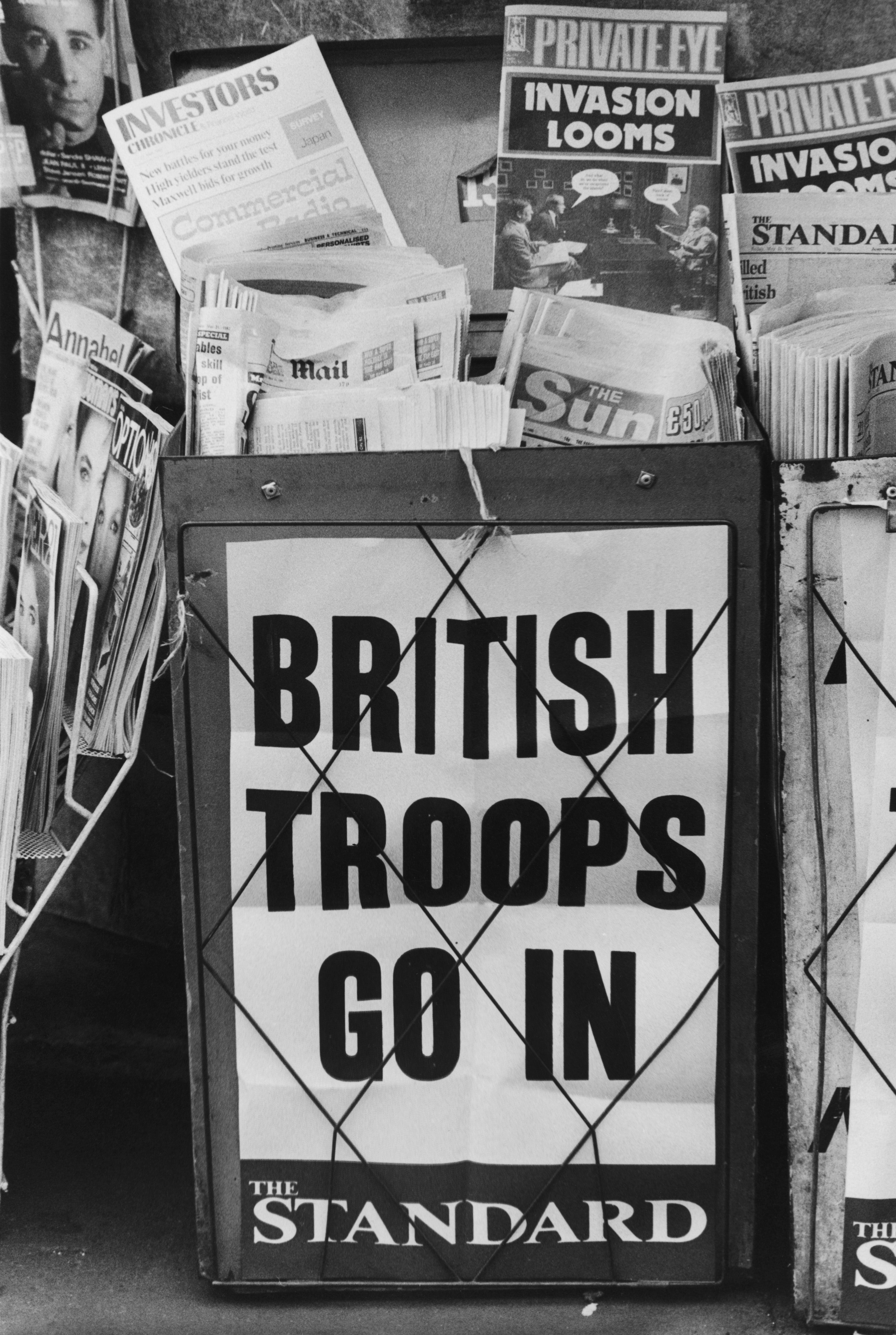 An Evening Standard headline on a London newspaper stand during the Falklands War reads: 'British Troops Go In', May 1982. (Photo by Central Press/Hulton Archive/Getty Images)