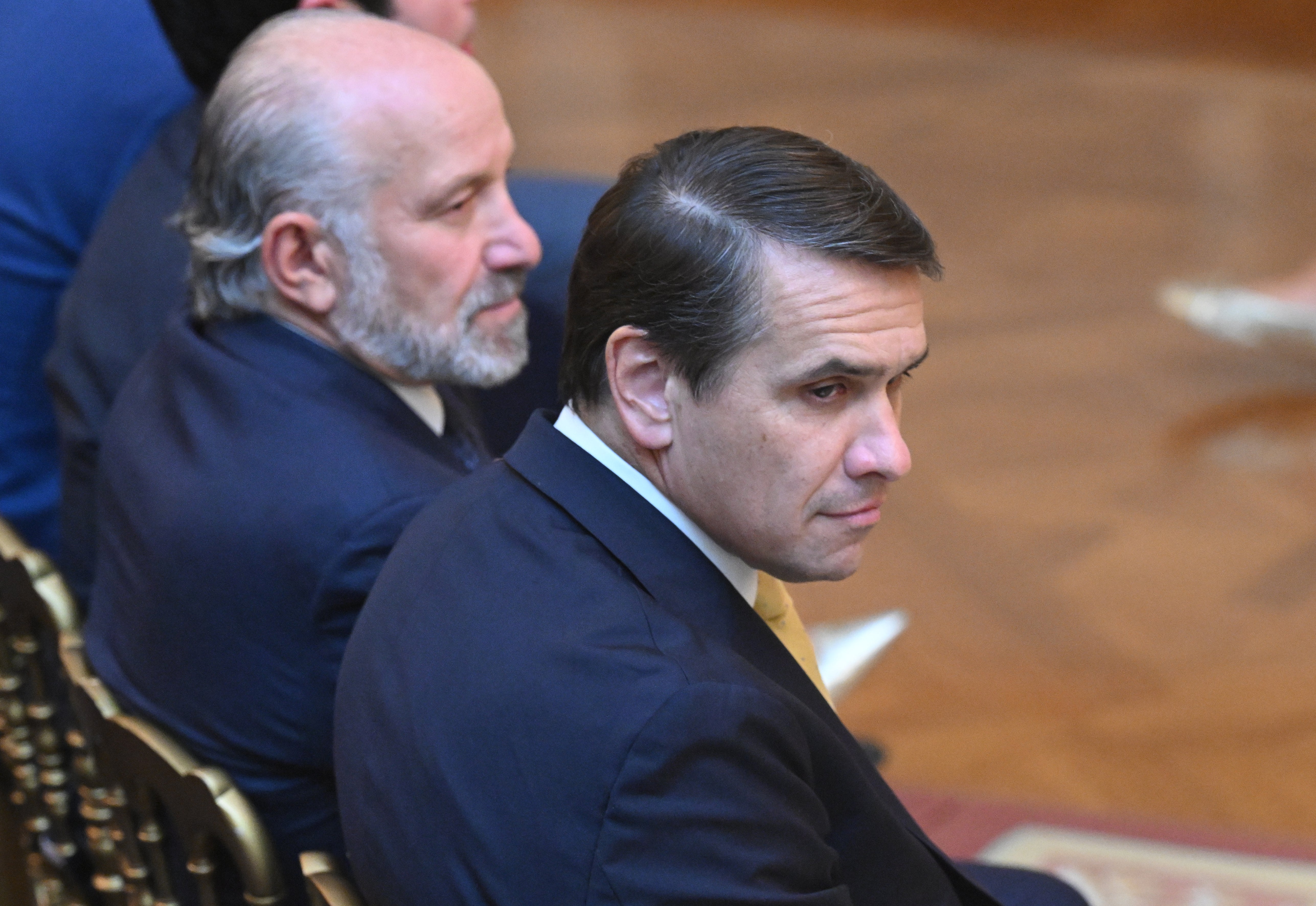 Acting Attorney General Todd Blanche (at right) and Commerce Secretary Howard Lutnick were among the Cabinet members in attendance for the speech. (Getty)