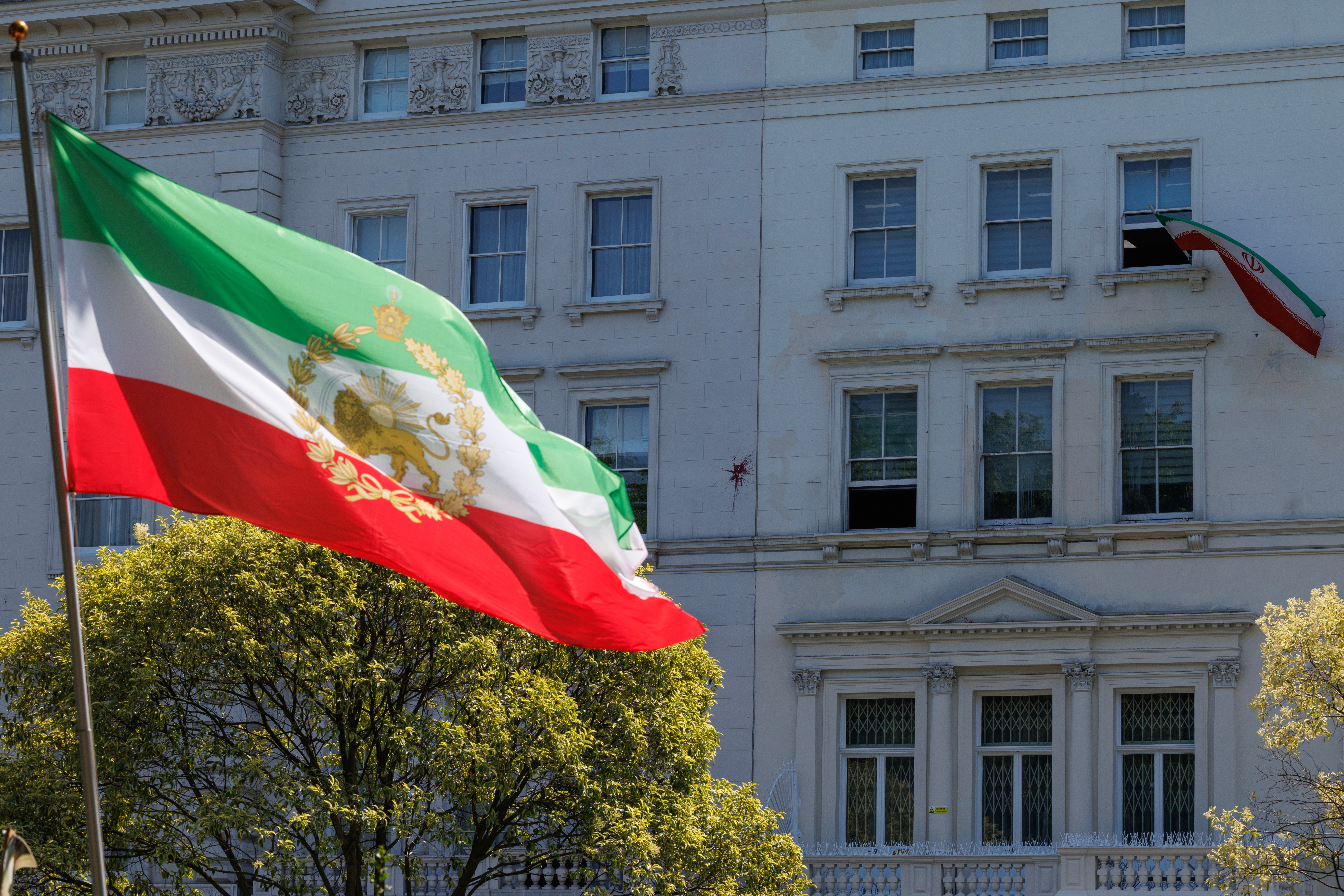 An Iranian flag flies outside the country's embassy in London