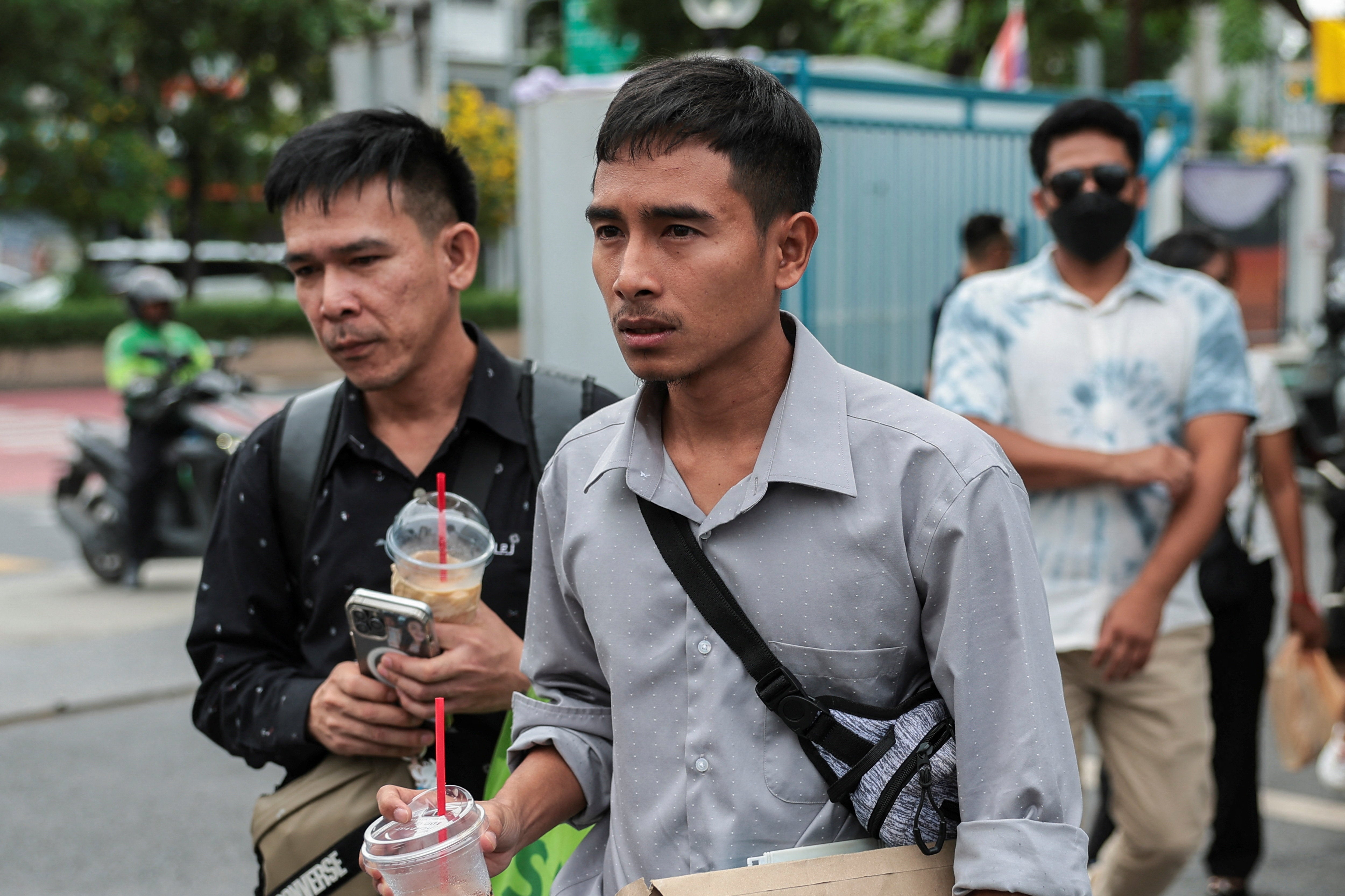 Panithi Tumkaew, 43, Noppadon Wongsuvan, 33, and Surades Manpuen, 32, Thai crew members of the cargo ship Mayuree Naree that was struck on March 11