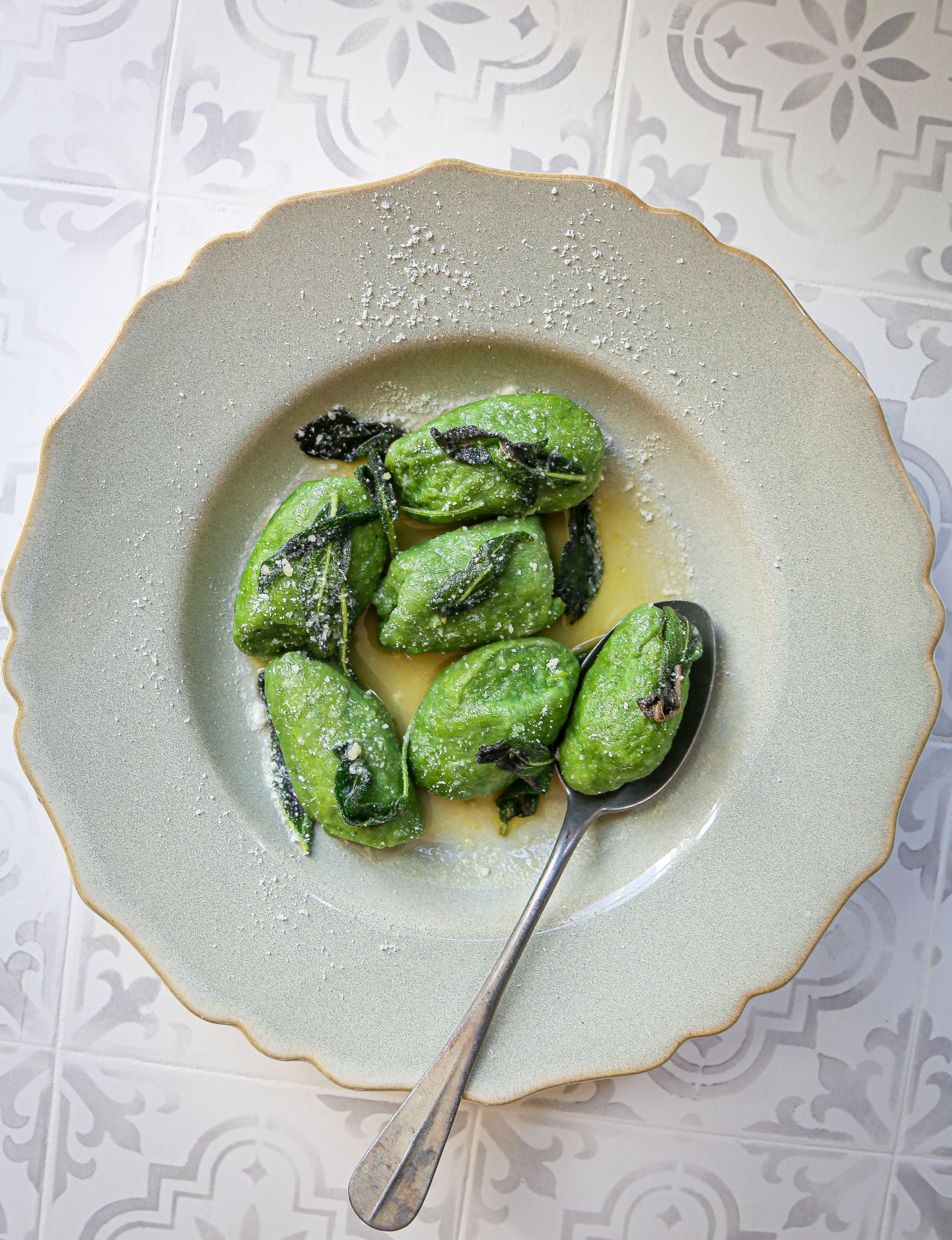 Ricotta and spinach gnudi offer comfort without complicated technique