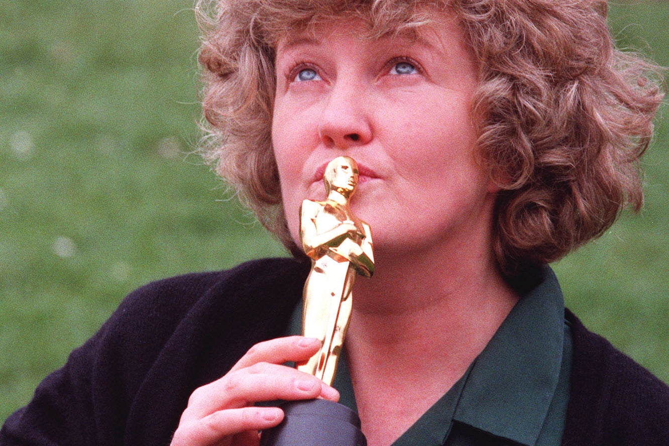 Brenda Fricker with her Oscar in 1990 (PA)