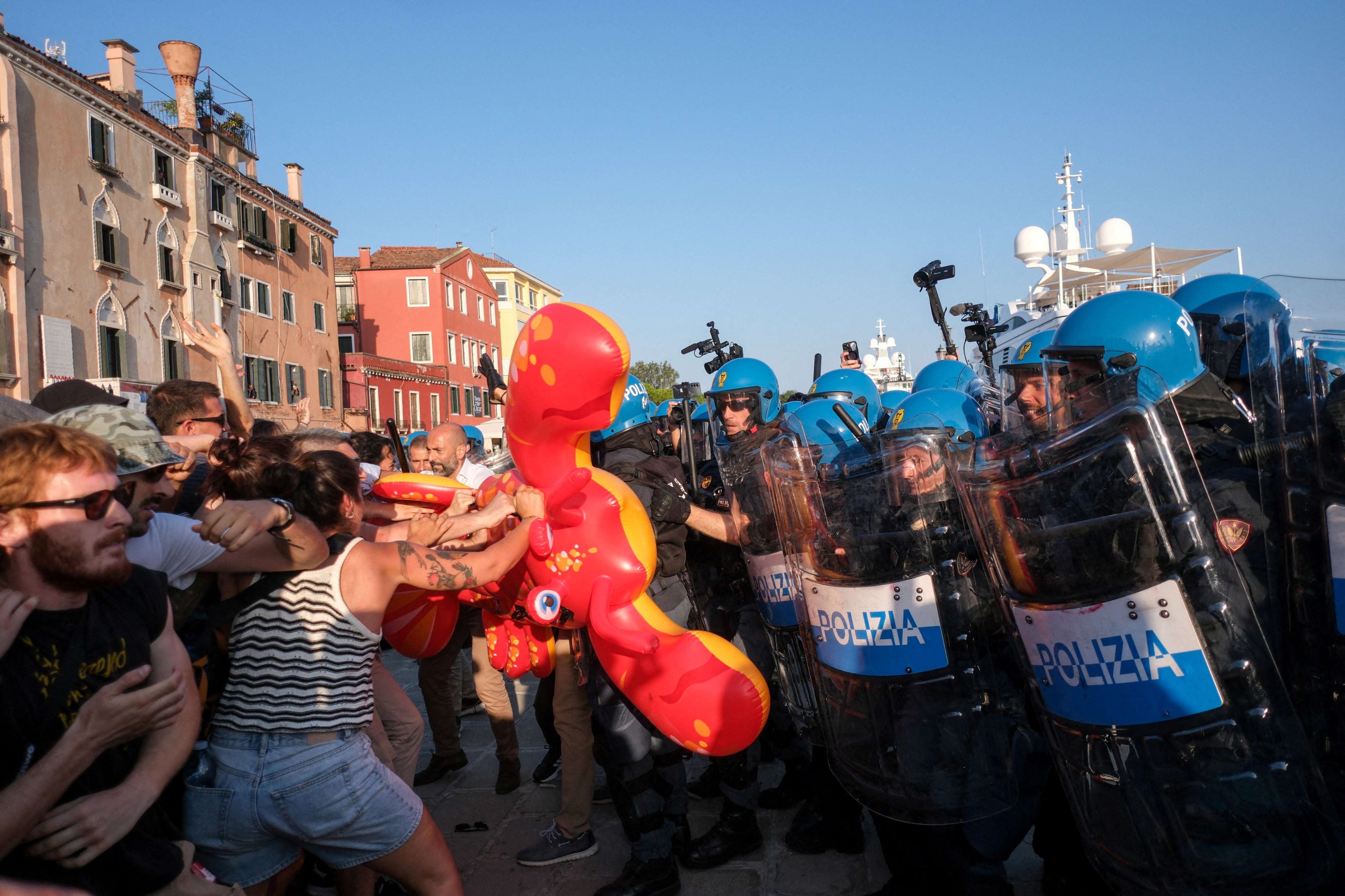 Protesters scuffle with police during the demonstration