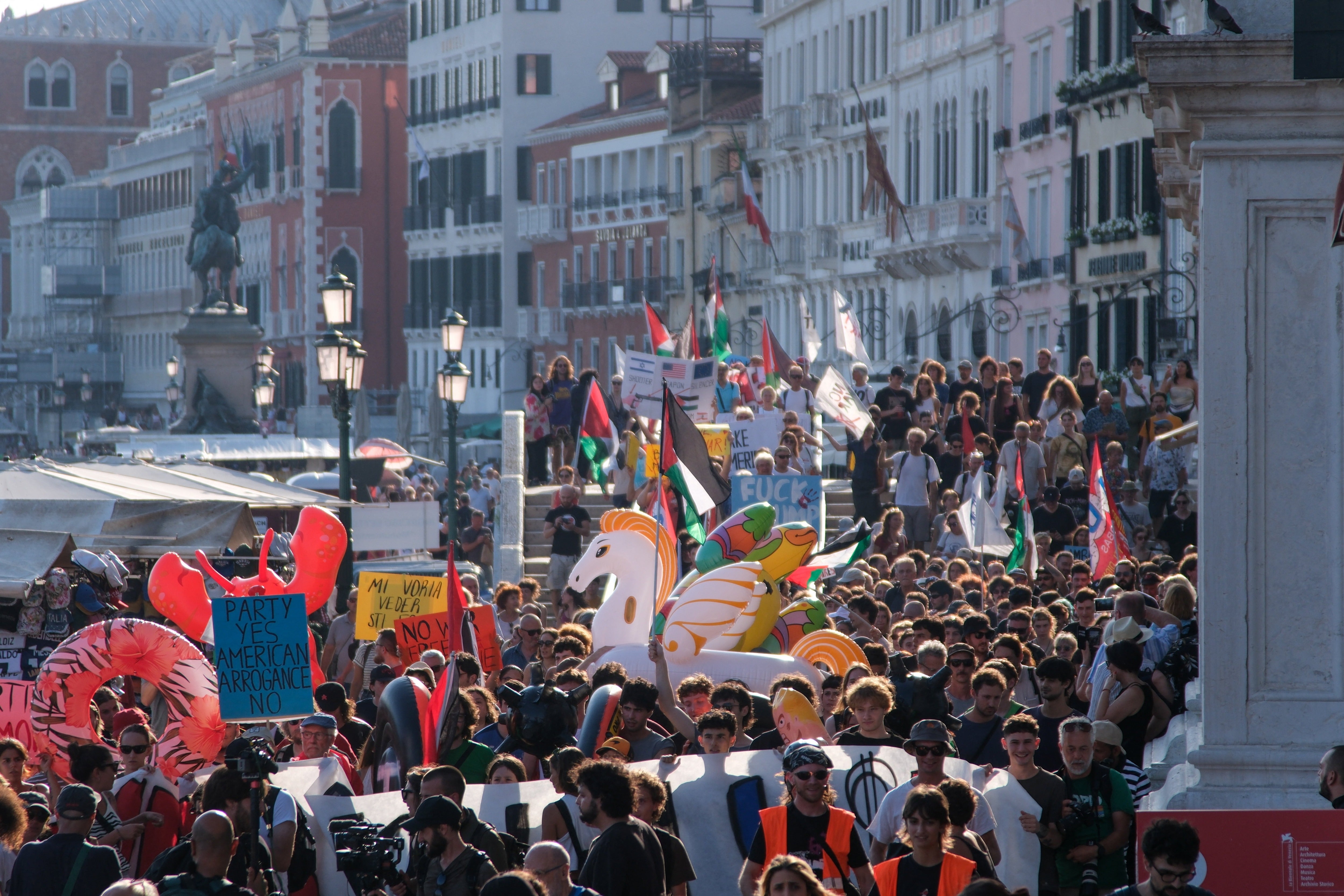 Hundreds of protesters marched against U.S. President Donald Trump’s policies and the visit of U.S. Ambassador to Italy Tilman Fertitta