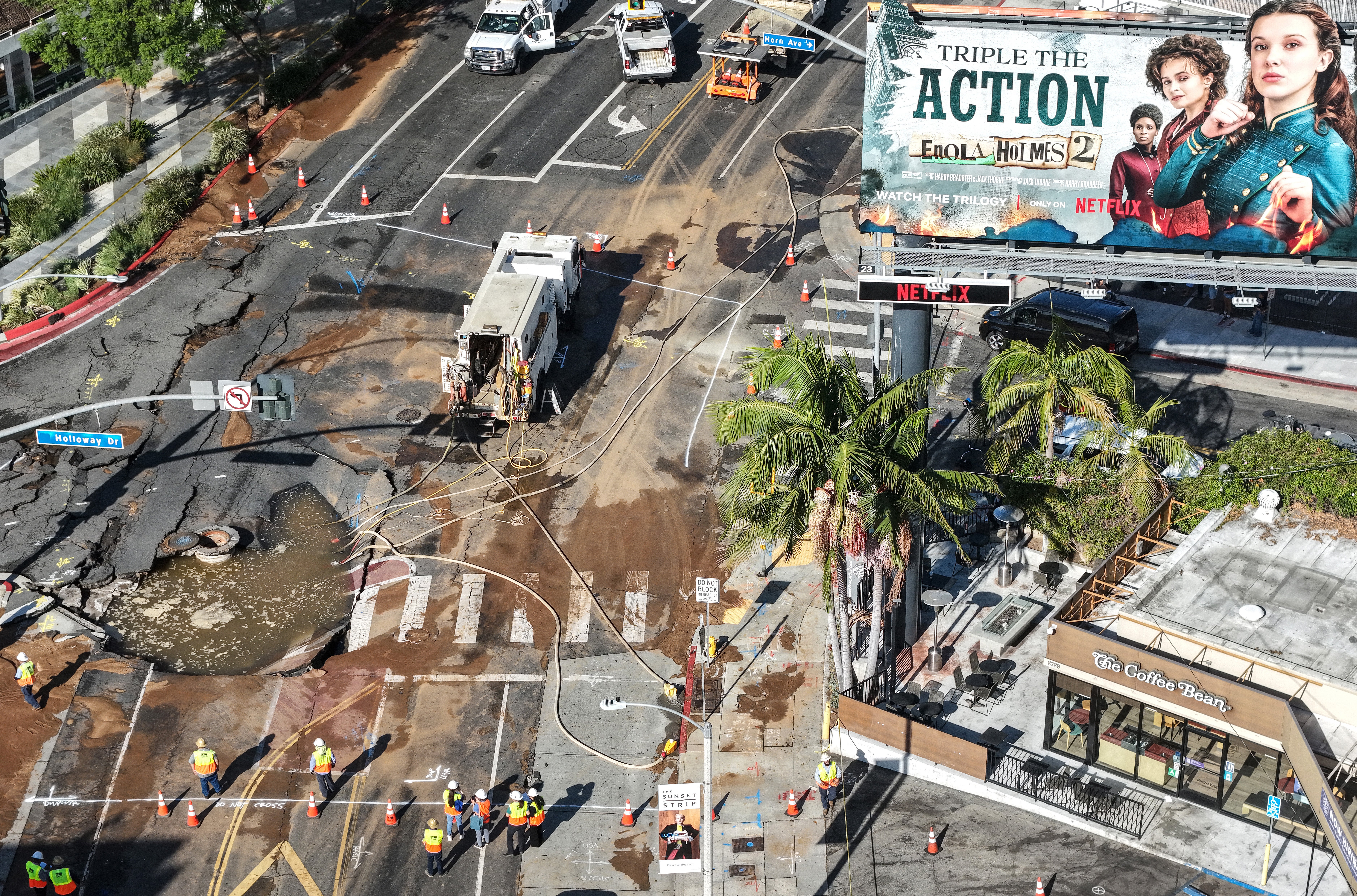 Century-old pipe bursts flooding famed Sunset Boulevard in Los Angeles
