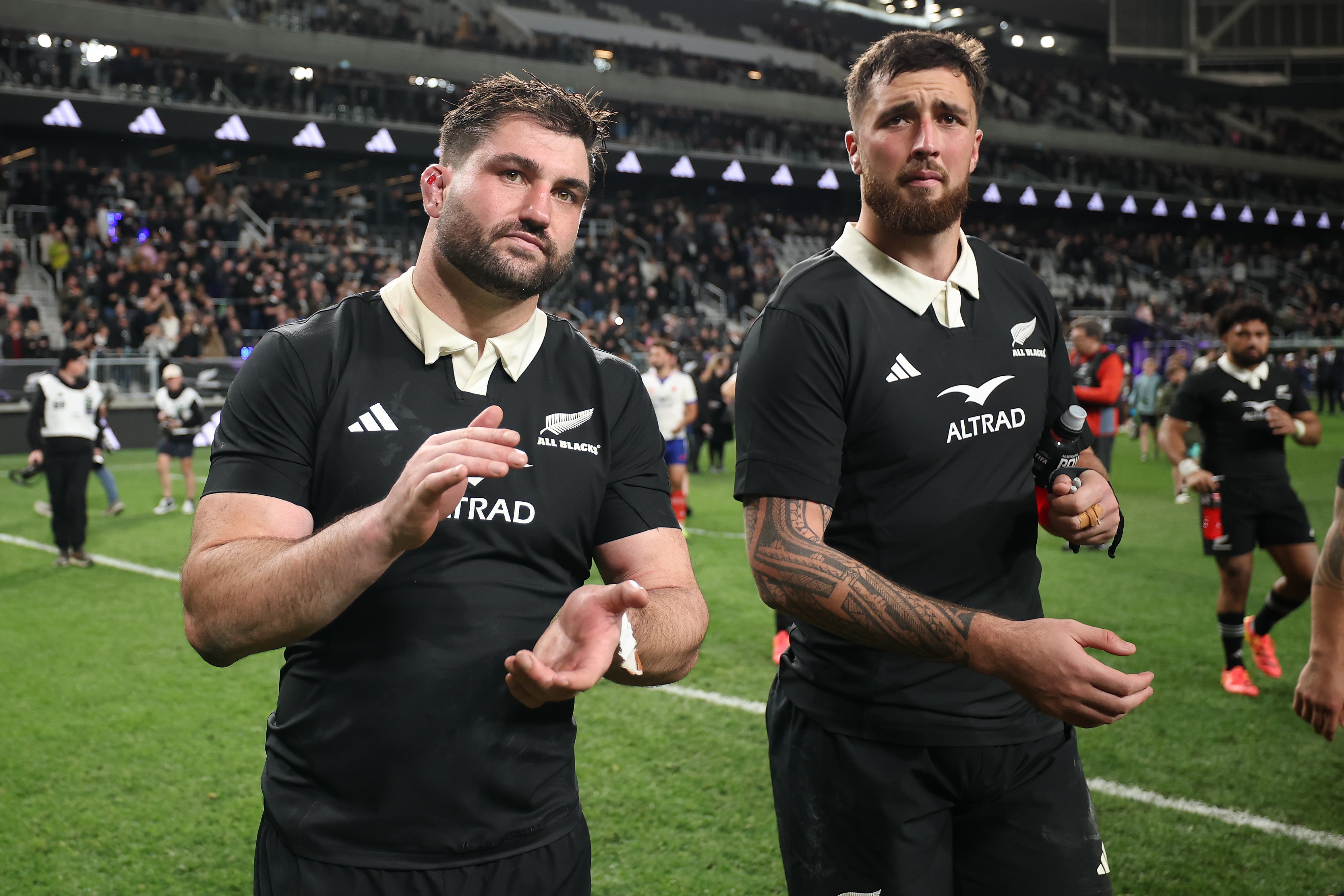 Luke Jacobson (left) leads the All Blacks