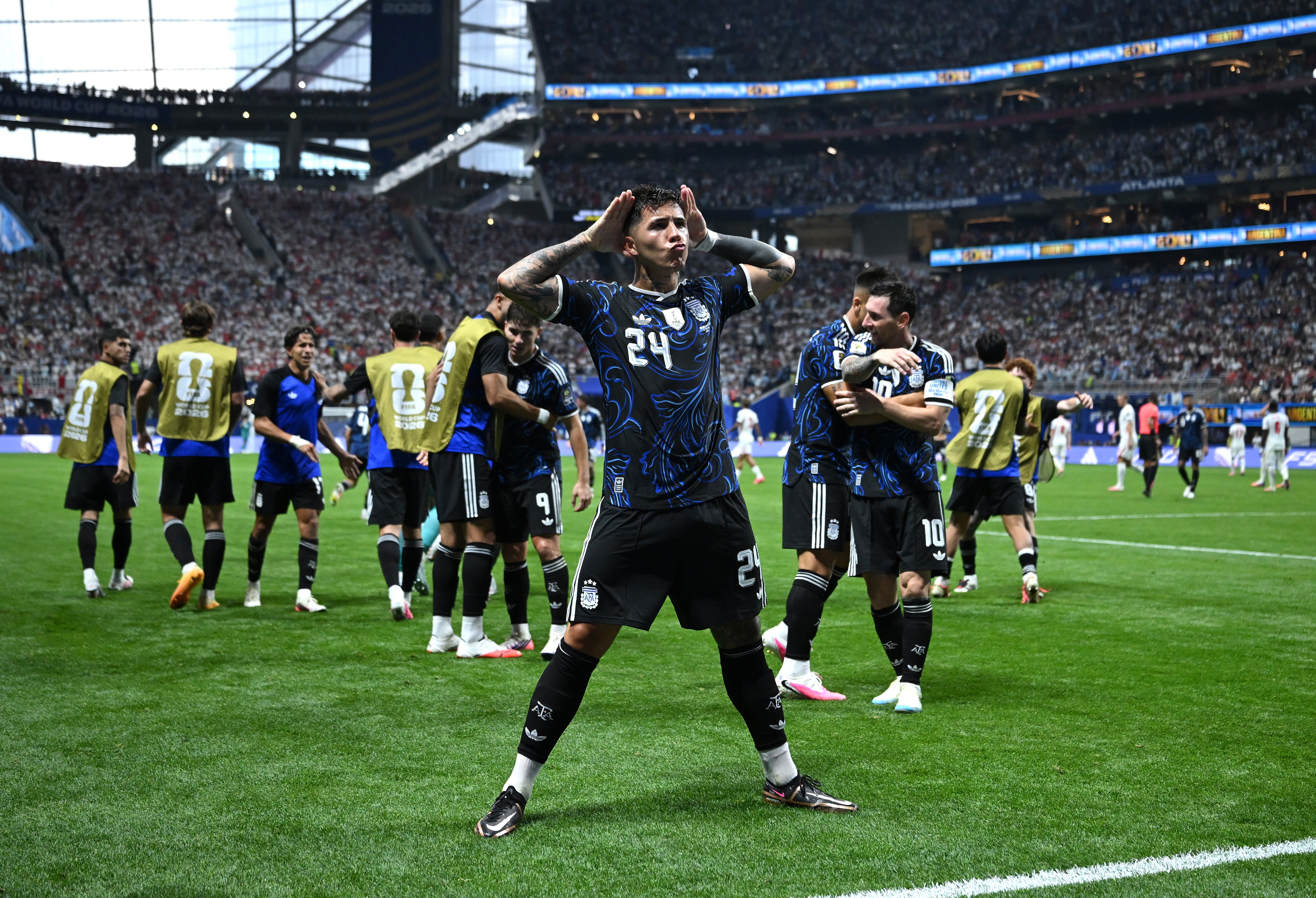 Enzo Fernandez of Argentina celebrates scoring against England (Getty)