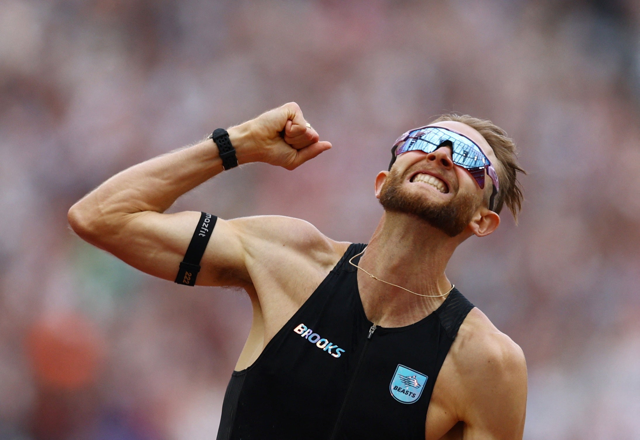 Britain's Josh Kerr celebrates after breaking the men's 1 mile world record