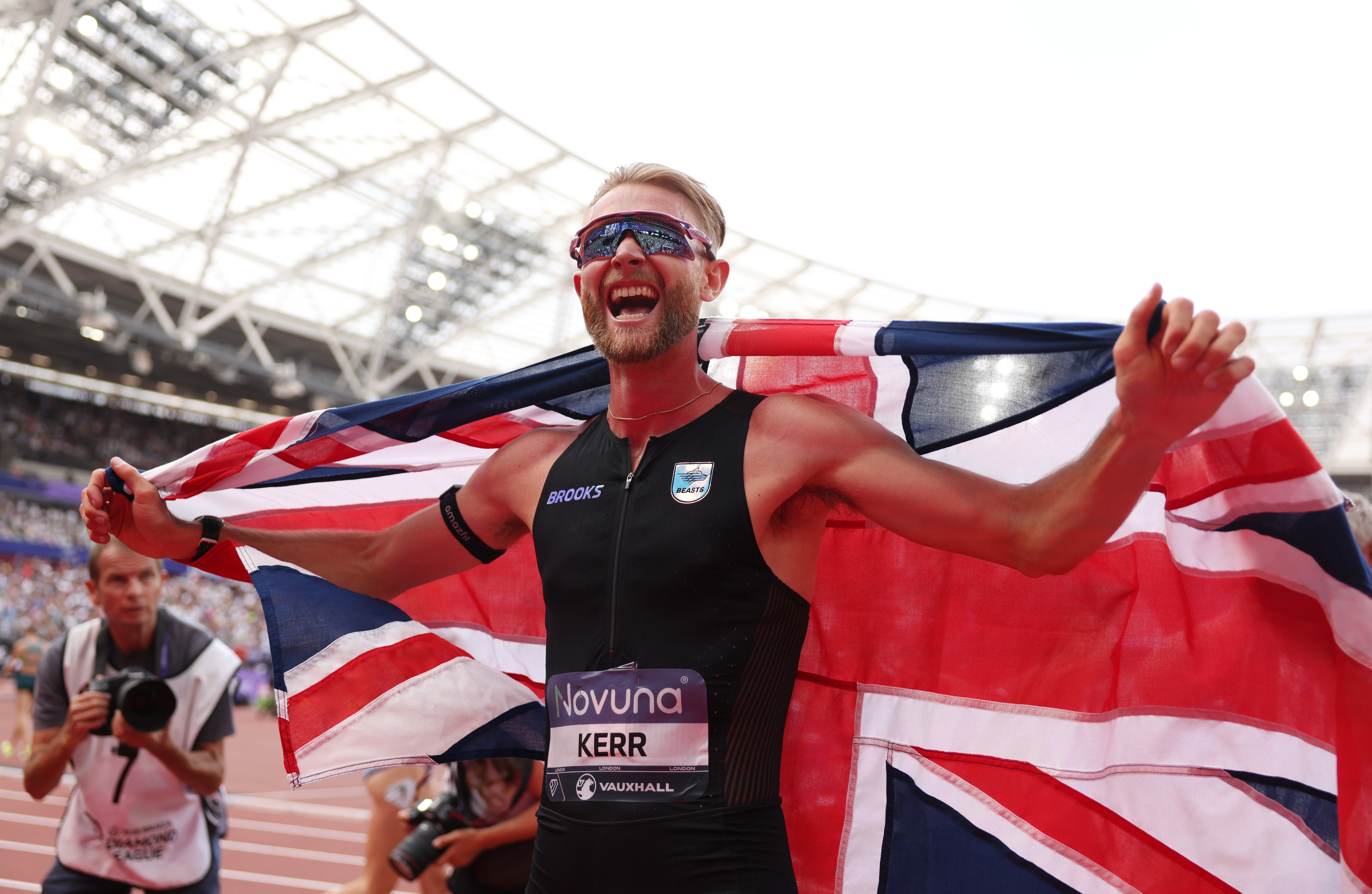 Josh Kerr of Team Great Britain celebrates after winning the 1 Mile Men's Final