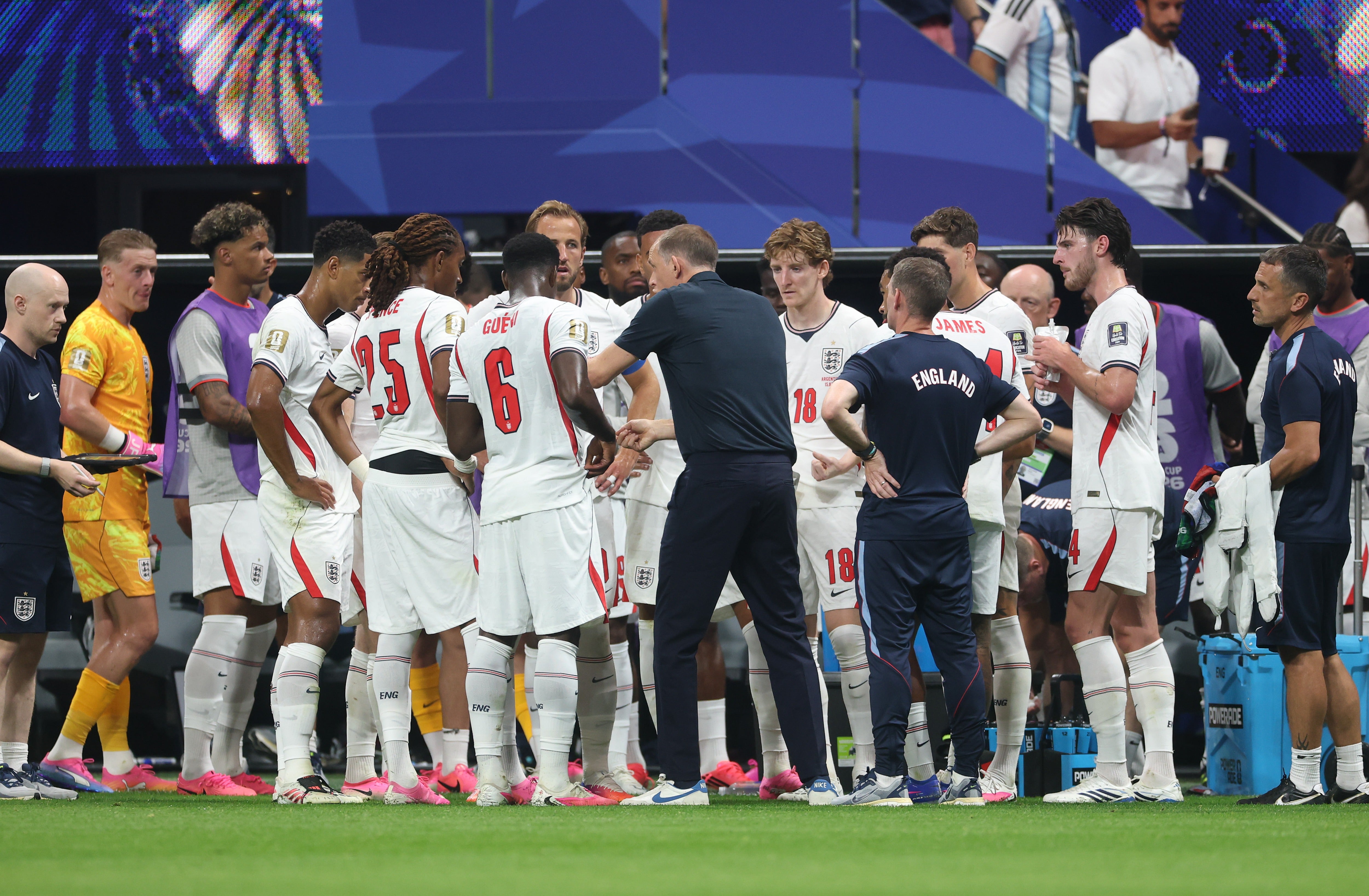 Thomas Tuchel speaks with his players during the hydration break during the FIFA World Cup 2026 Semi Final match between England and Argentina at Atlanta Stadium on July 15, 2026