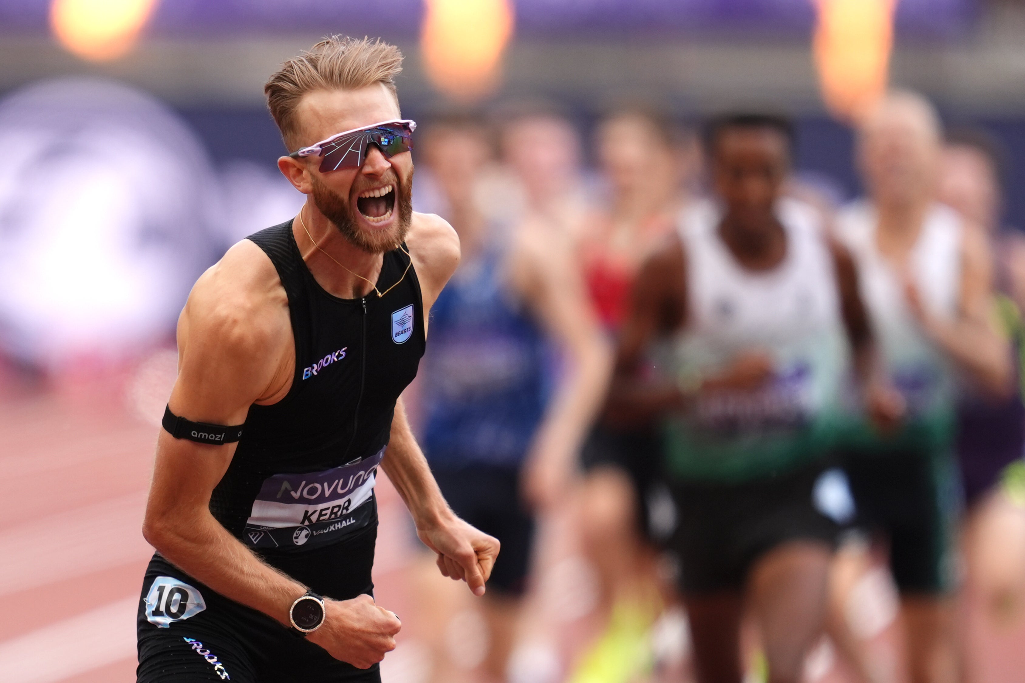 Josh Kerr celebrates as he crosses the line (Adam Davy/PA).