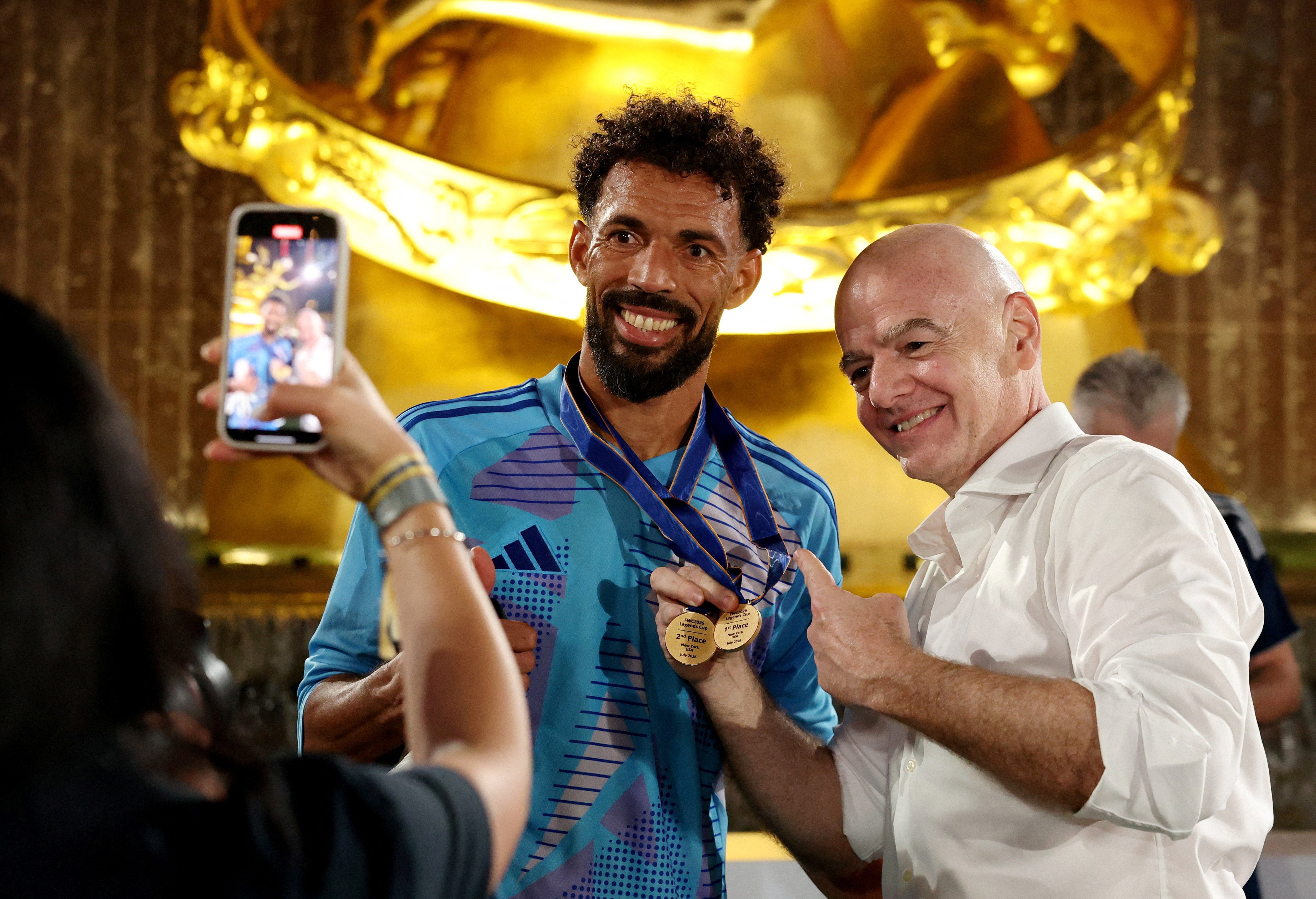 FIFA President Gianni Infantino poses for a picture with Cape Verde's Vozinha (Reuters)