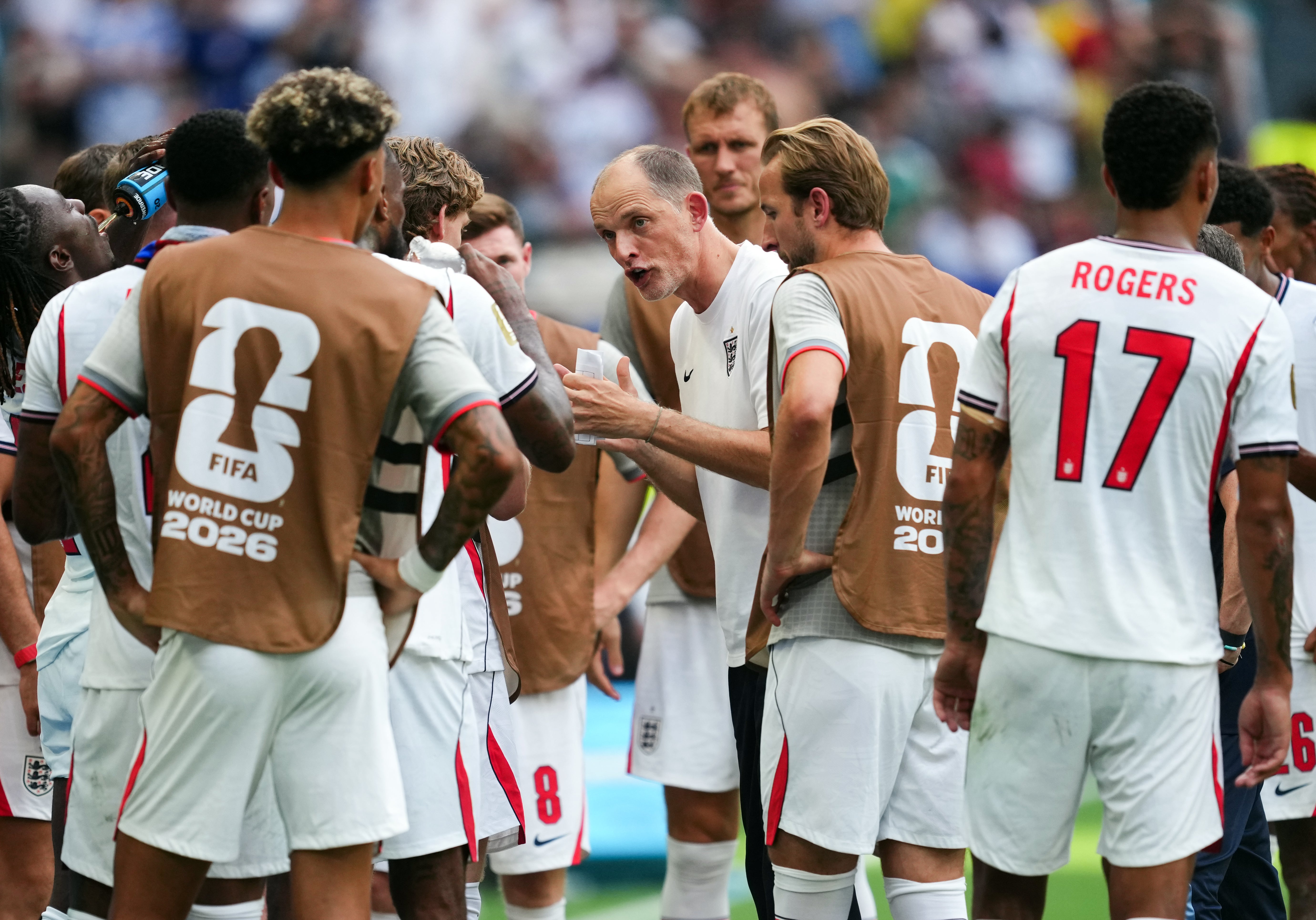 Thomas Tuchel, centre, talks to his England team during the World Cup third-place play-off against France (Martin Rickett/PA)
