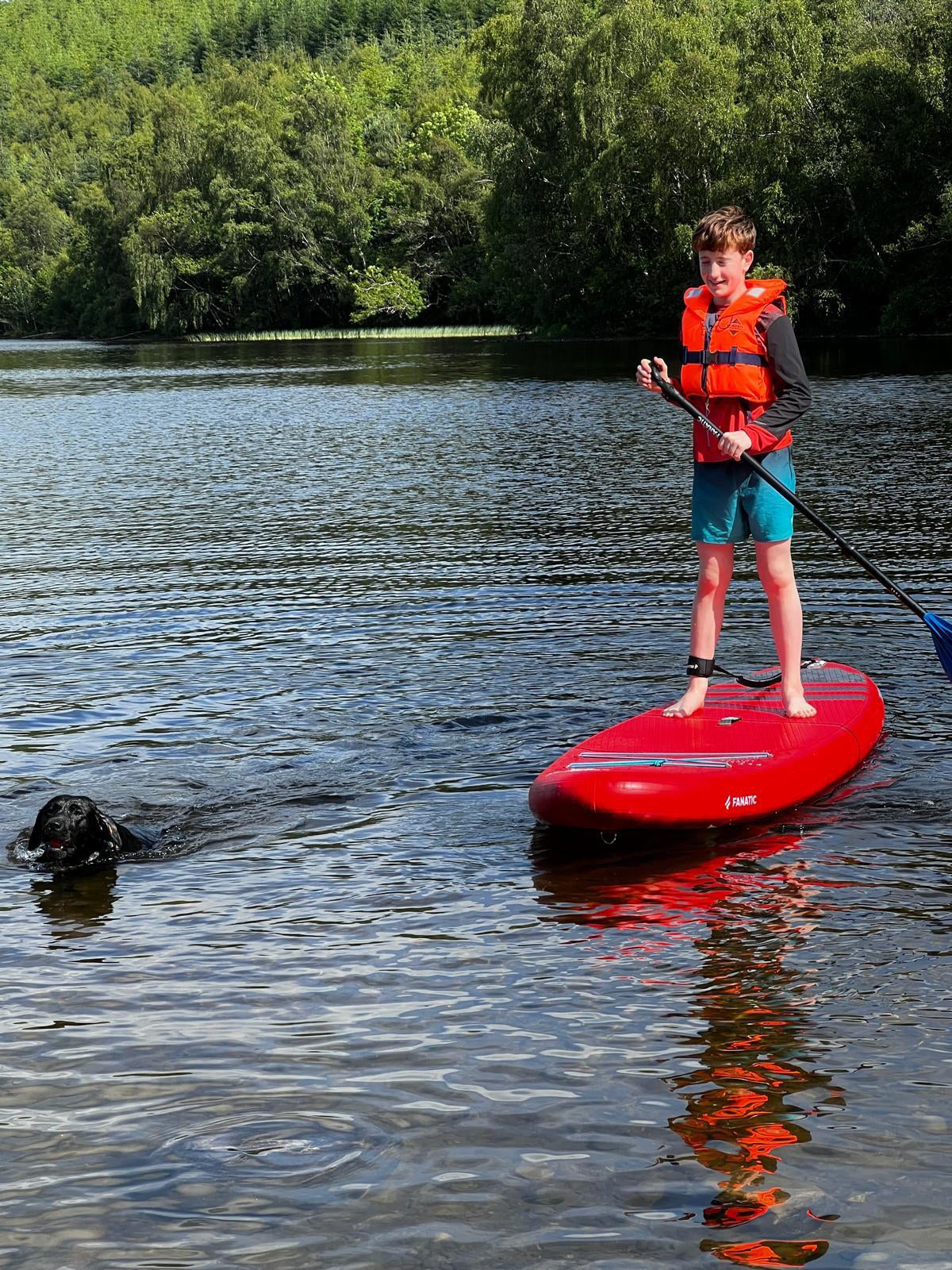 Toby Peart on a stand-up paddle board
