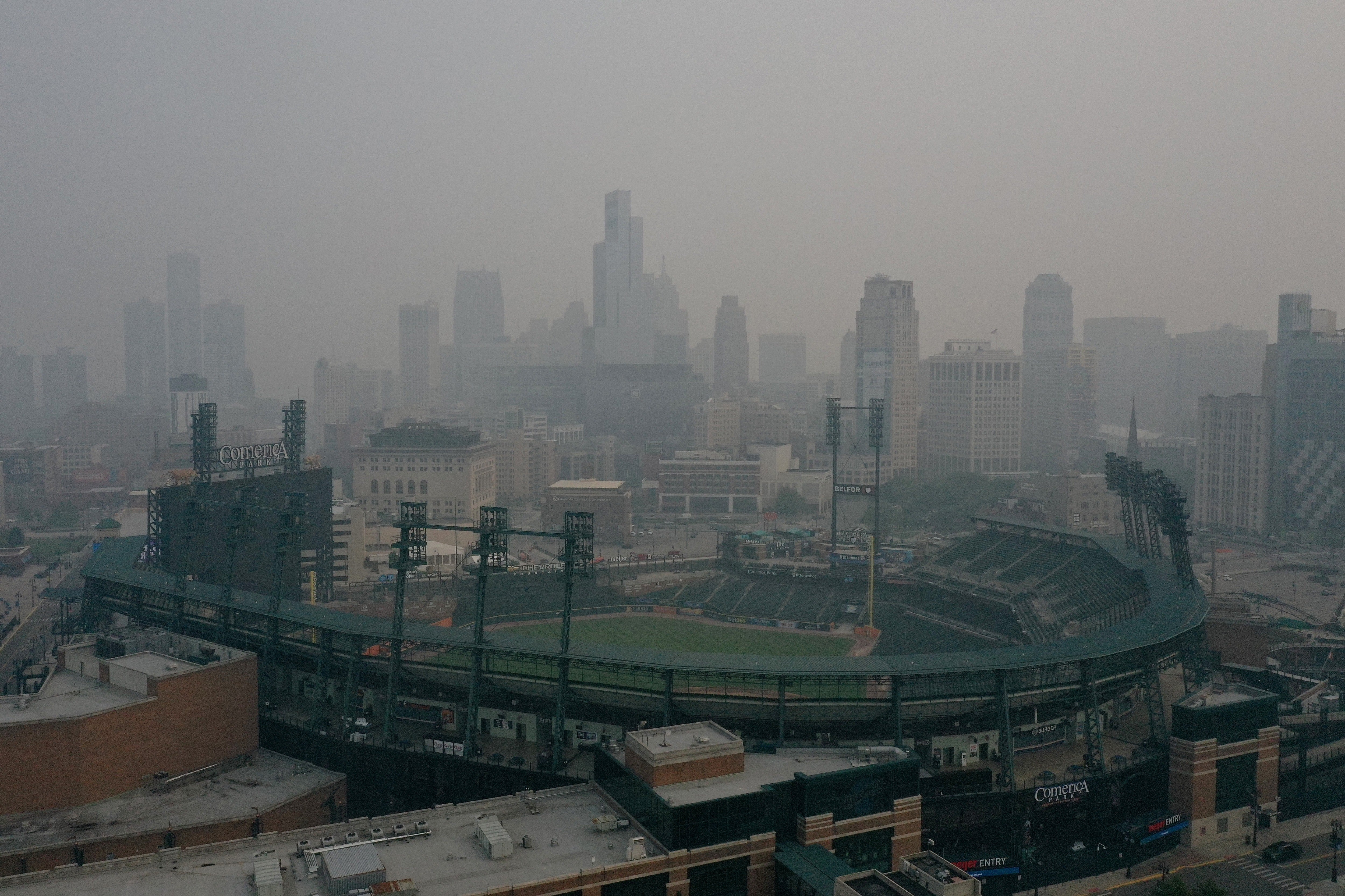 The Detroit skyline as smoke from the Canadian wildfires settles in the city on July 16, 2026
