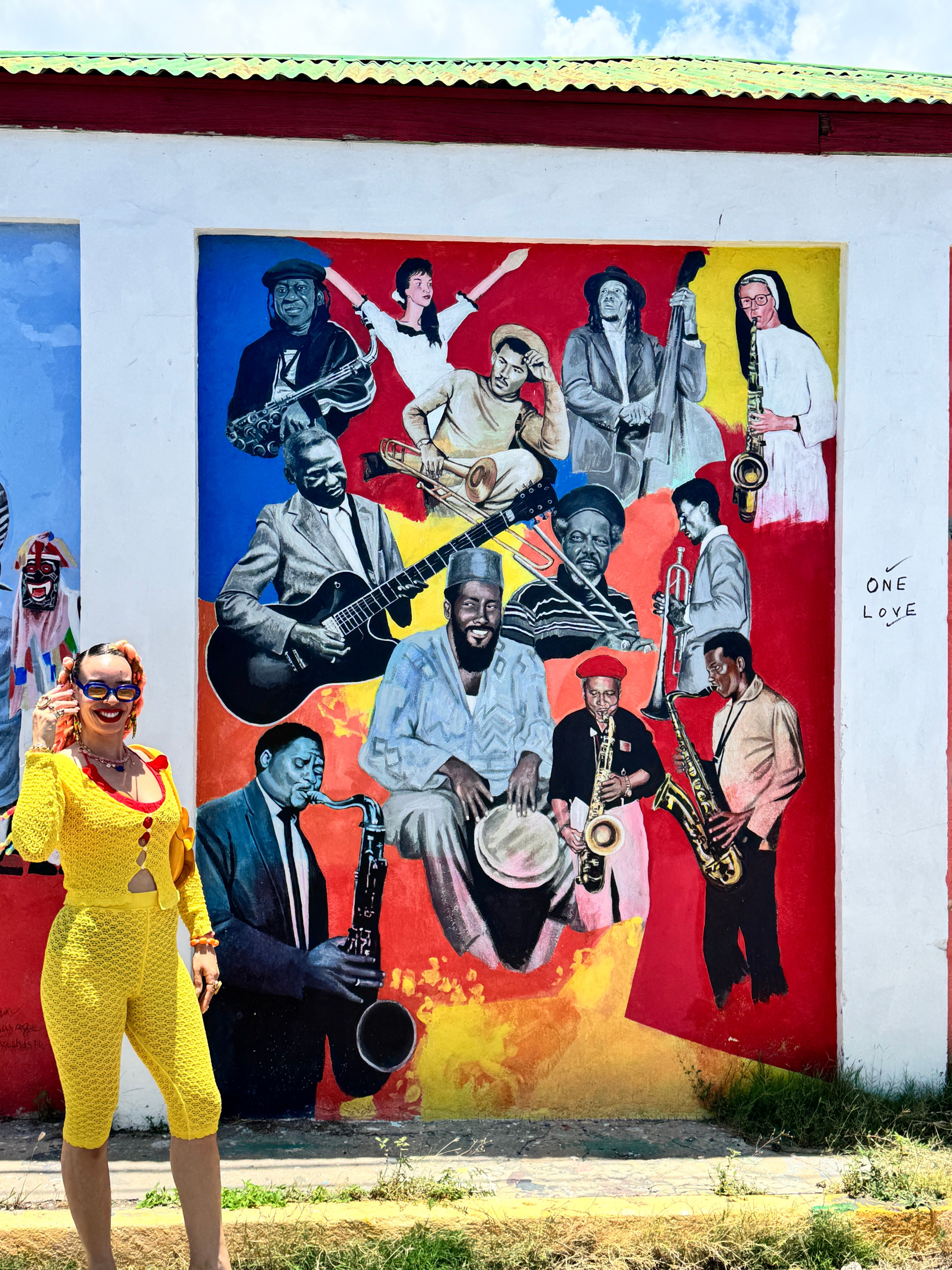 Sadie exploring the murals in Kingston Art District