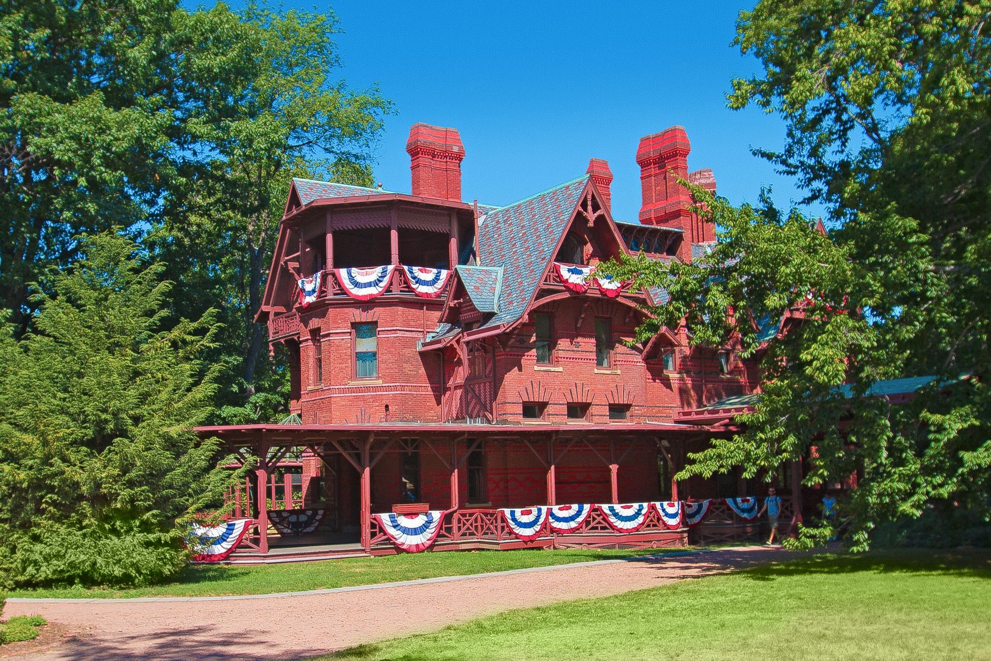 Mark Twain’s house is defined by its red brick, ornate chimneys and playful gables (Adams & Knight)