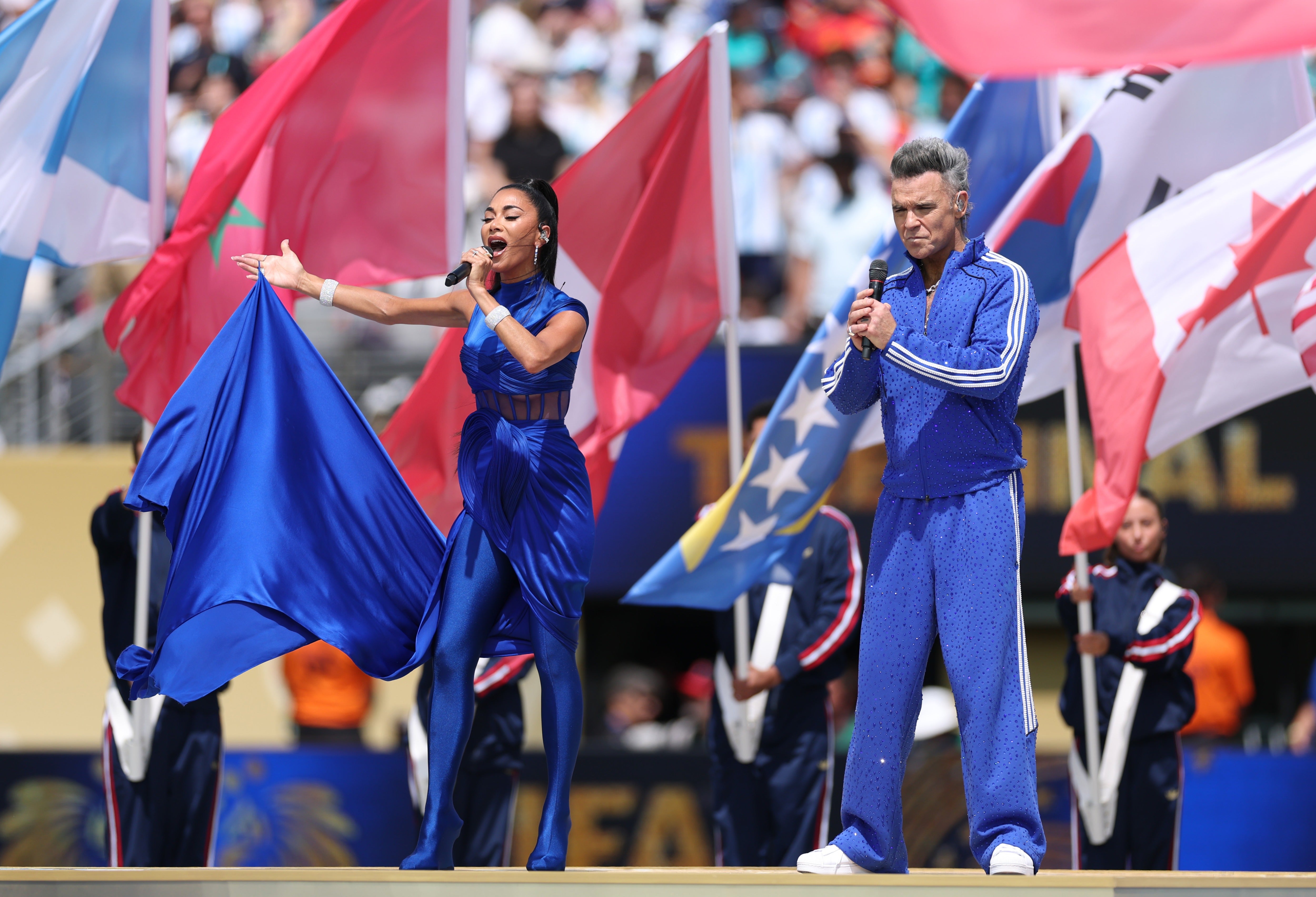 Robbie Williams performed the official Fifa anthem, Desire alongside Pussycat Doll Nicole Scherzinger and Italian singer-songwriter Laura Pausini (Getty Images)