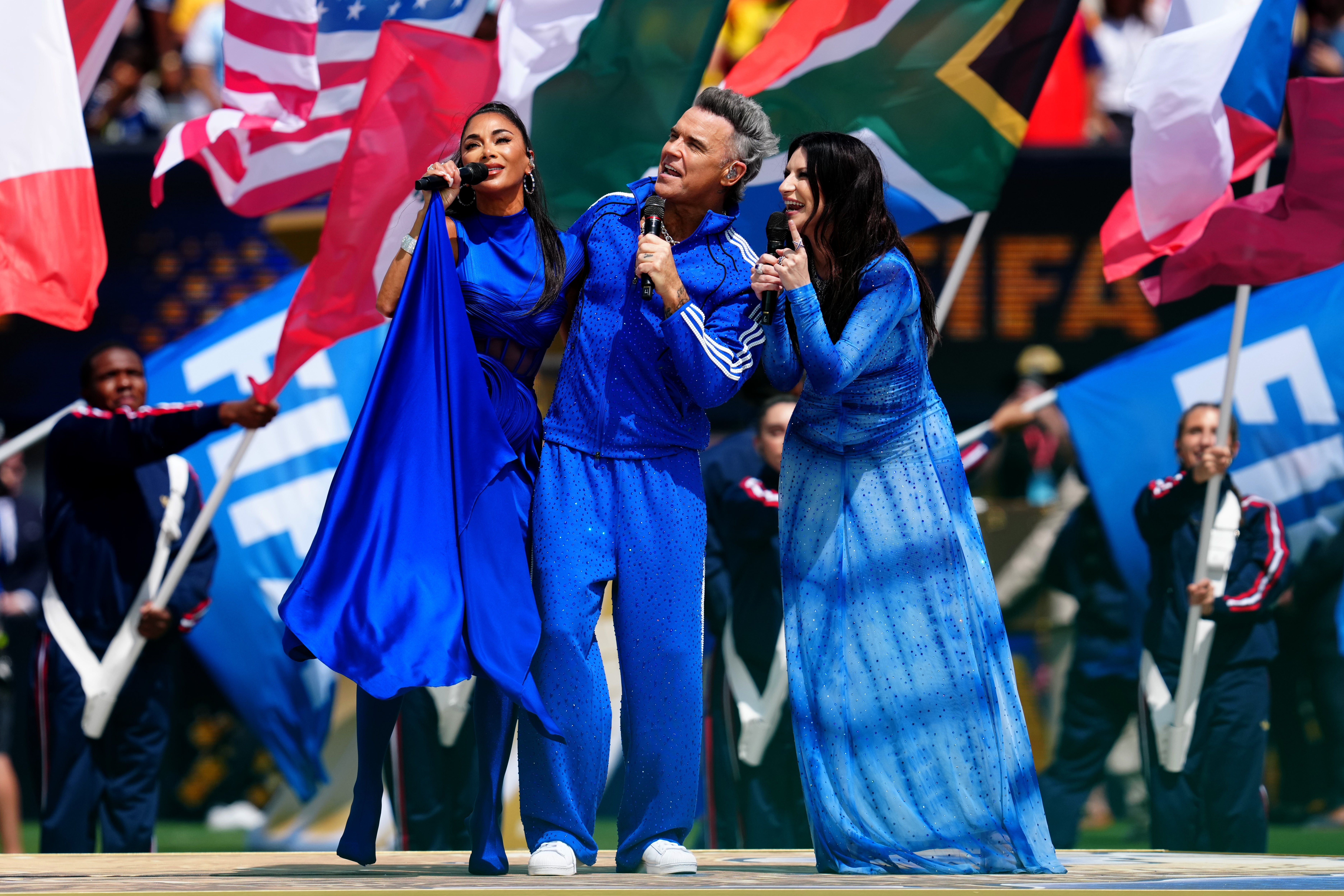 Nicole Scherzinger, Robbie Williams and Laura Pausini (Nick Potts/PA) (PA Wire)