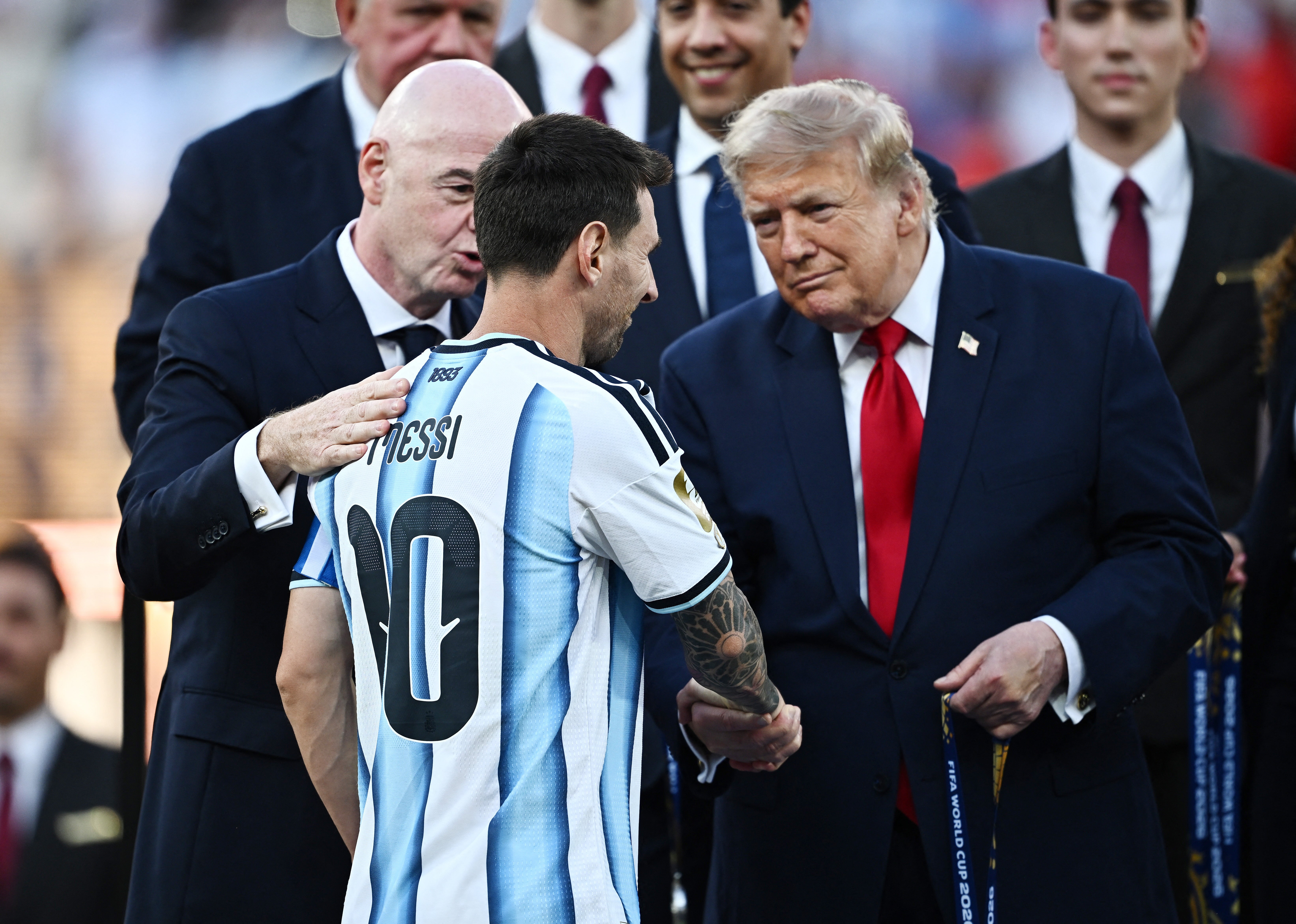 Argentina's Lionel Messi shakes hands with US President Donald Trump
