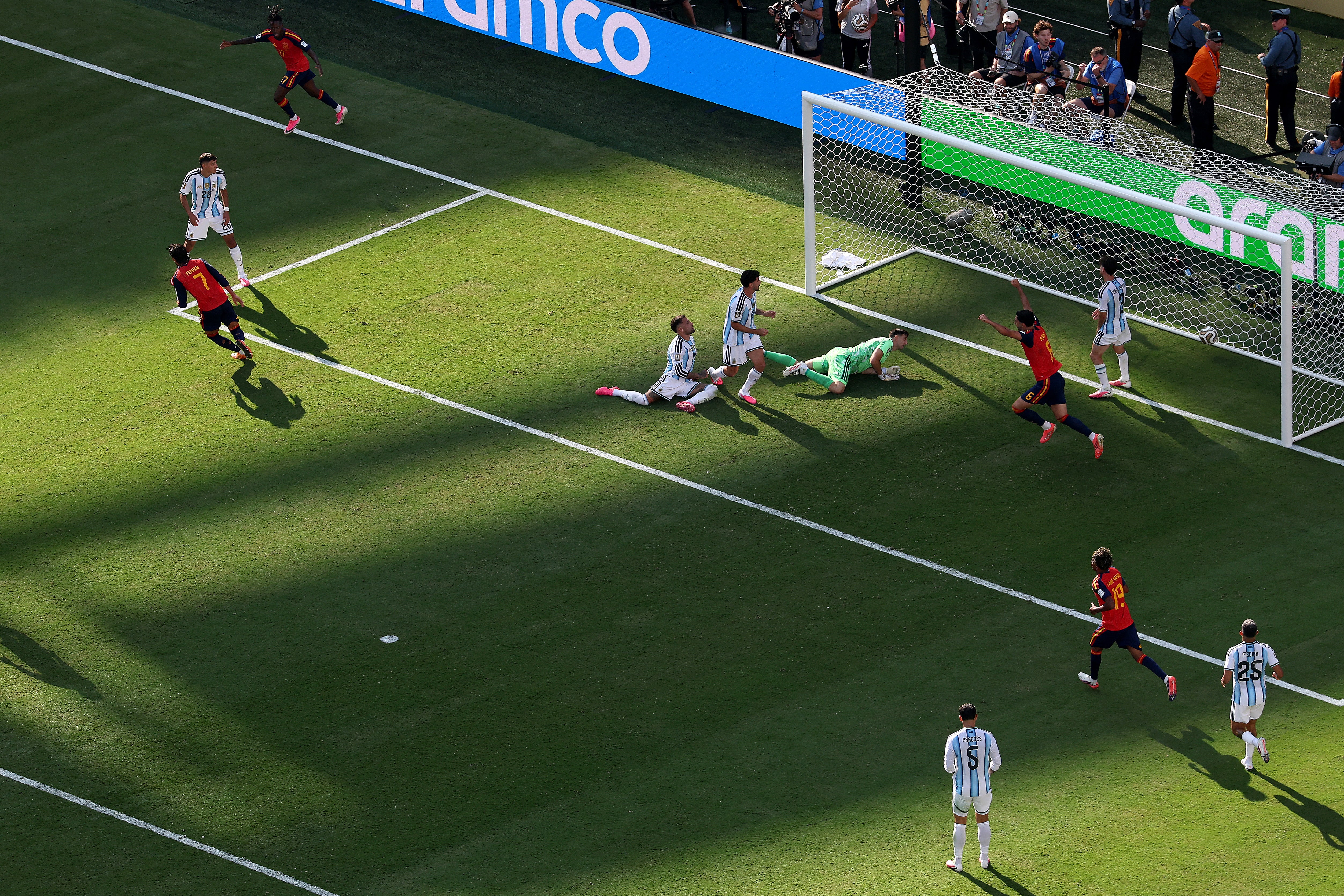 Ferran Torres, left, turns away to celebrate after scoring Spain's winner