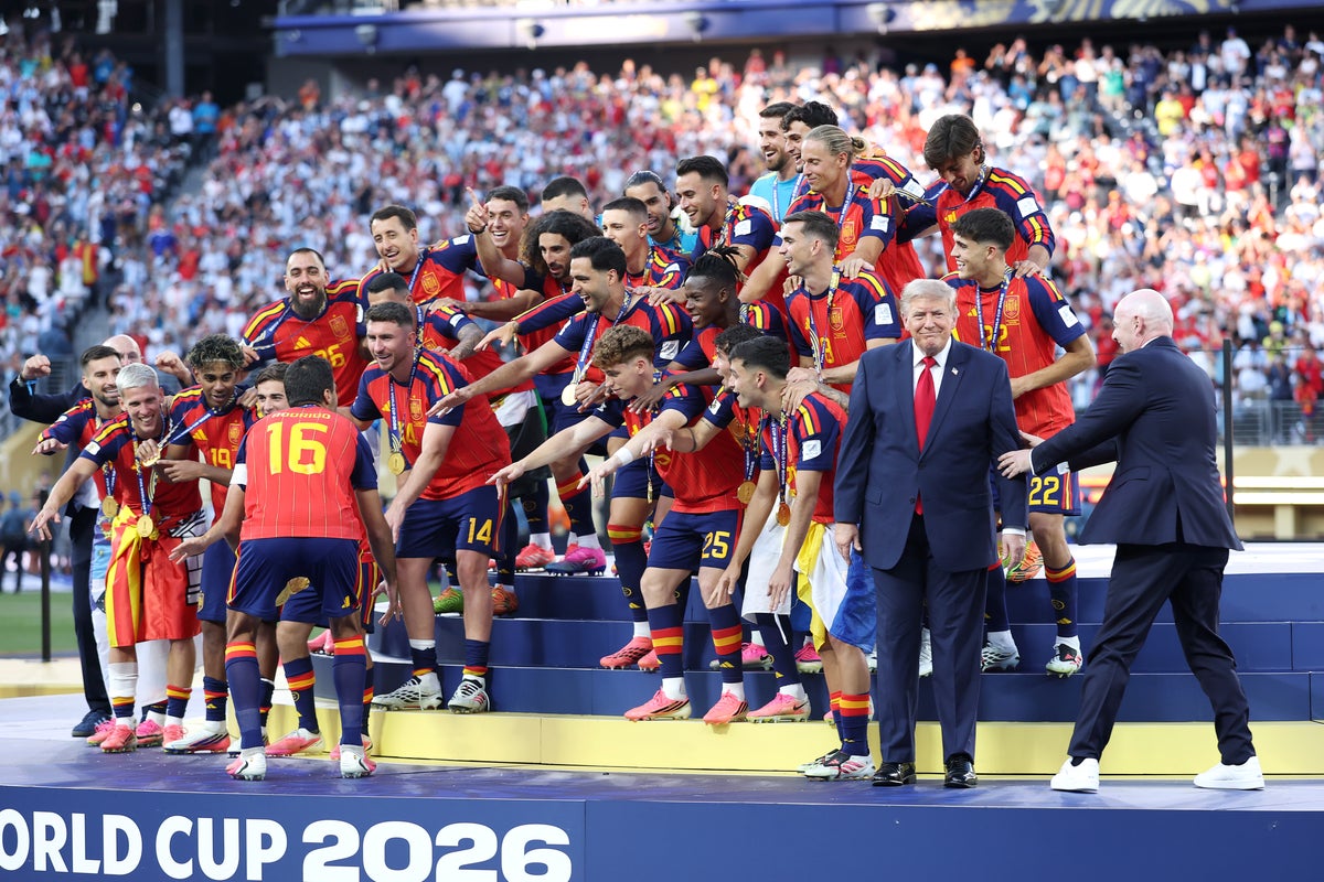Trump steps all over World Cup winner's moment as Infantino tries to usher him away from Spain trophy lift | The Independent