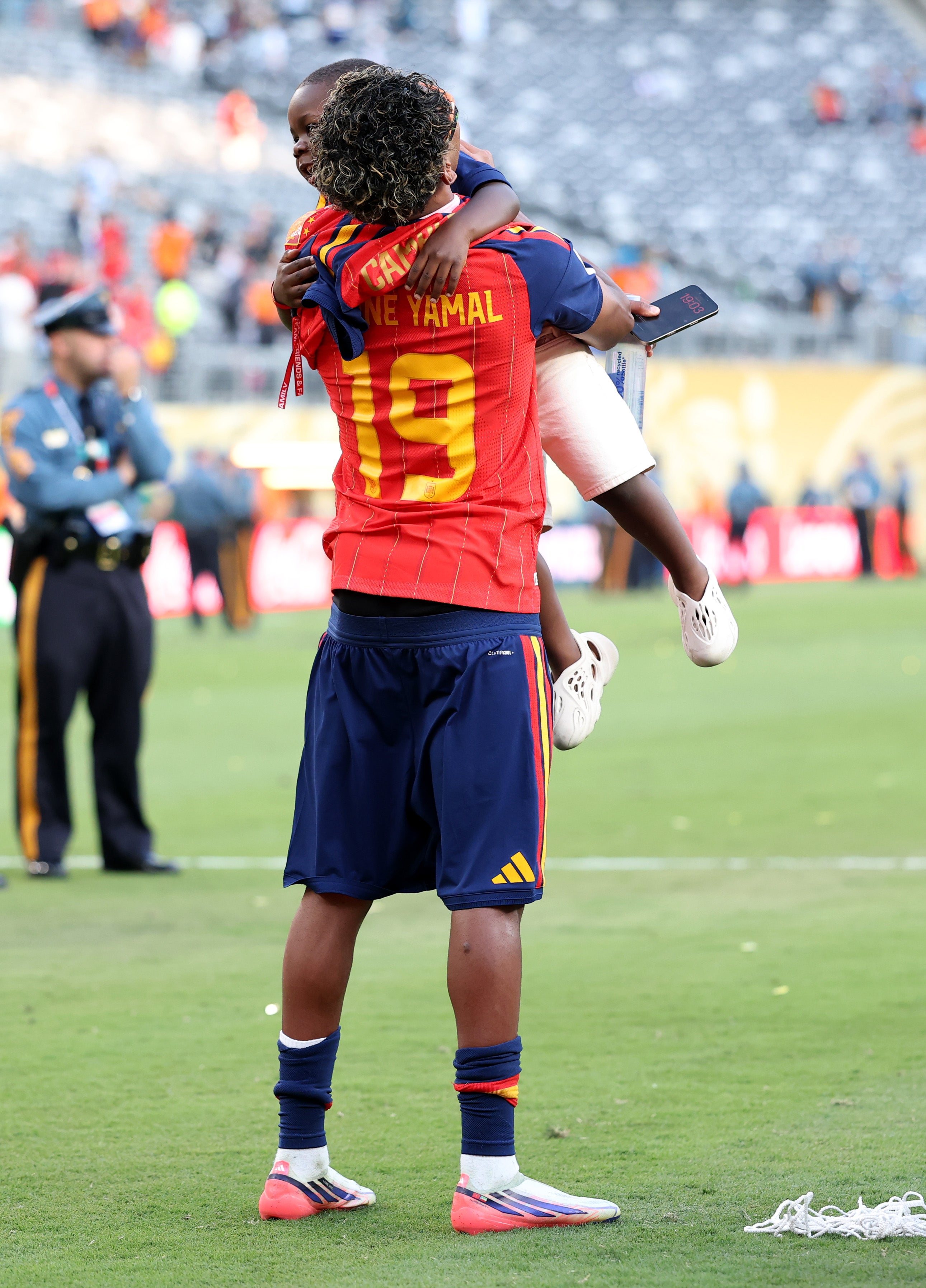 Lamine Yamal #19 of Spain celebrates with his little brother Keyne (Getty)