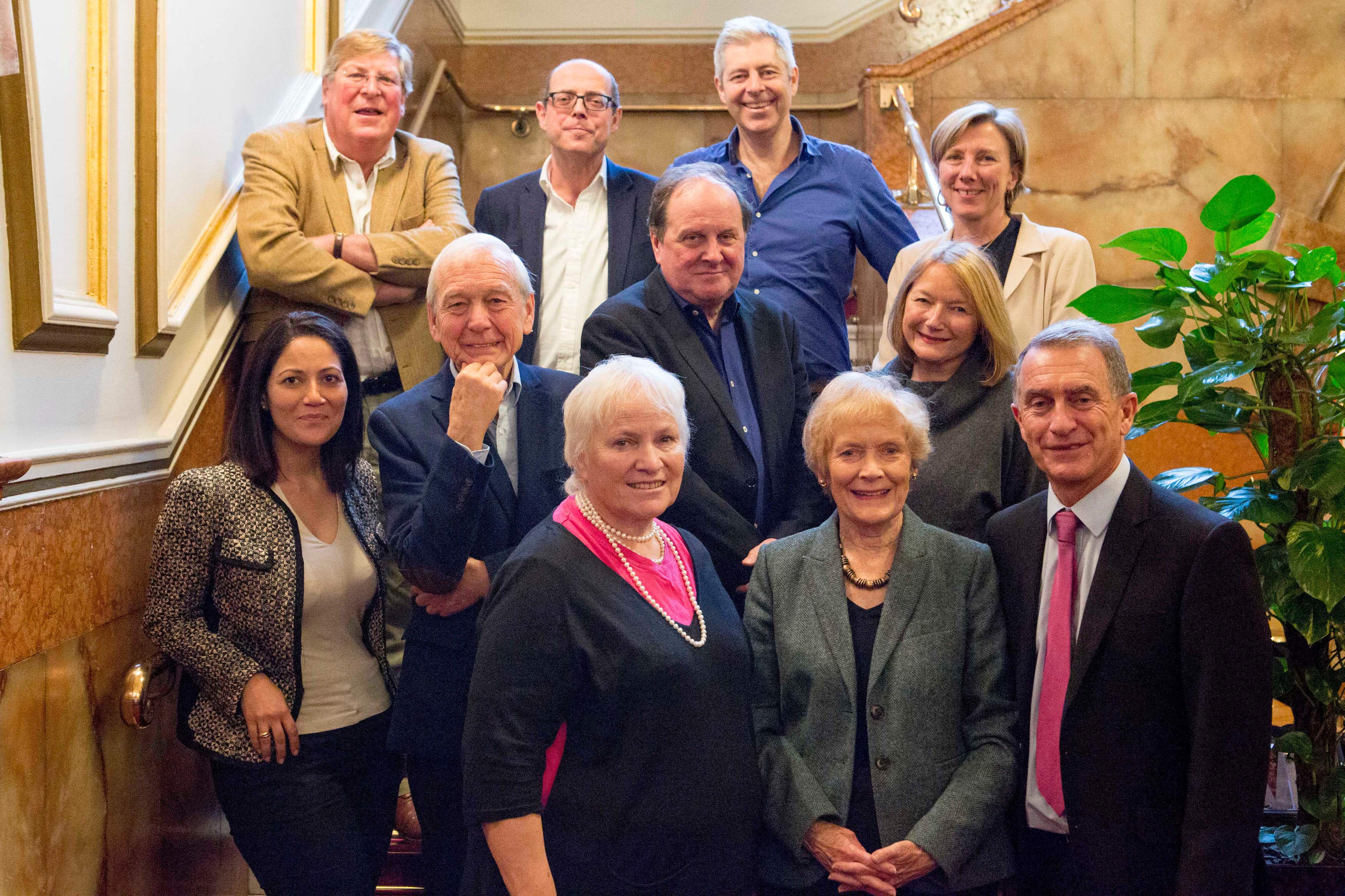 The veteran newsreader, top left, died on Saturday surrounded by his family, the BBC said