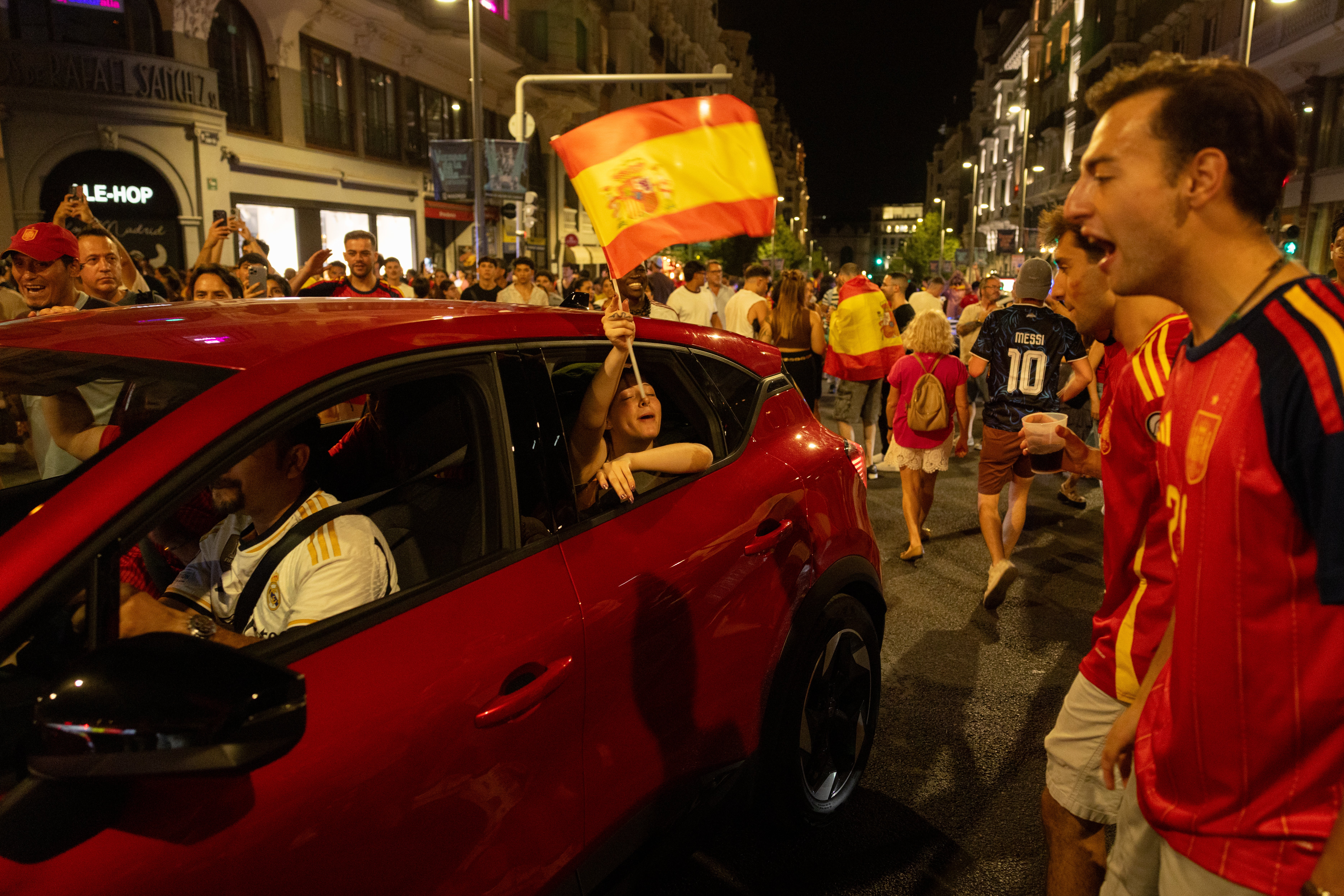 Spanish fans celebrate Spain's win at the FIFA World Cup 2026 final in Madrid, Spain.