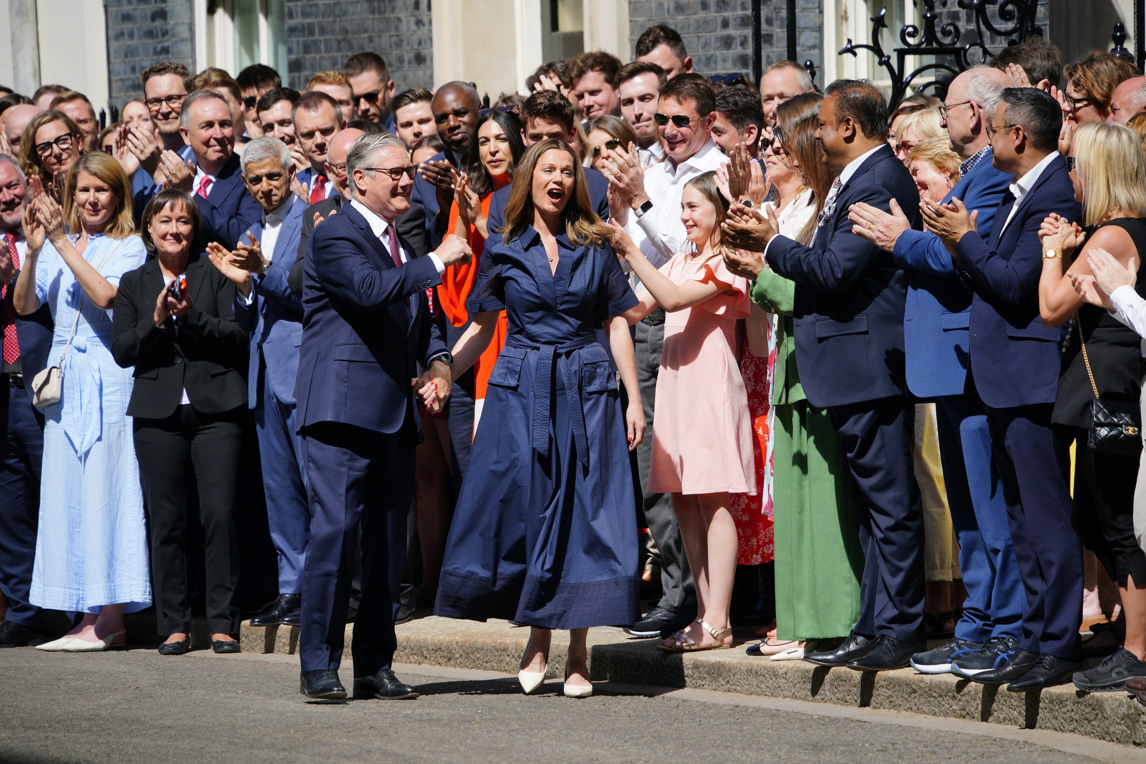 Sir Keir walked down the street with his wife Victoria after delivering his speech (Ben Birchall/PA) (PA Wire)