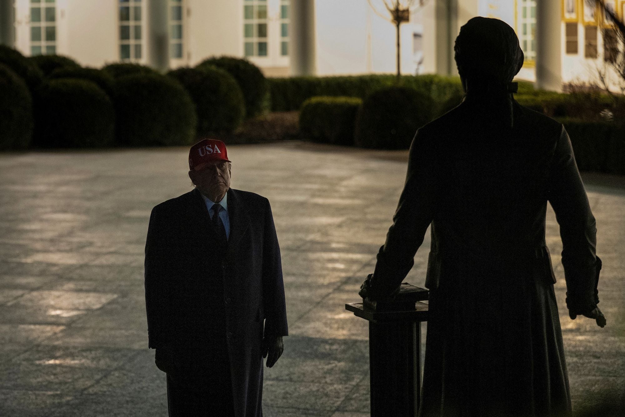 Earlier this year, another statue of Jefferson was seen in the Rose Garden, which Trump was pictured standing in front of on March 1 (AFP via Getty Images)
