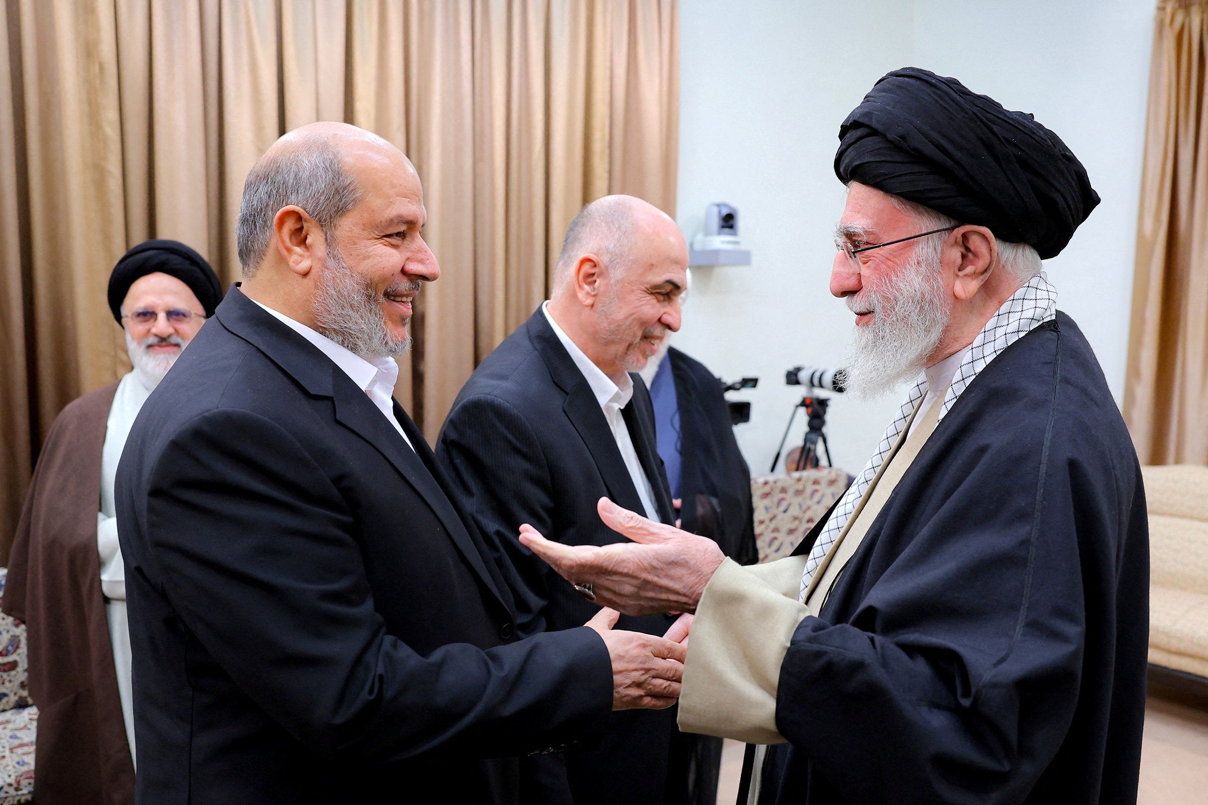 Khalil al-Hayya, left, meets with Iran's late Supreme Leader Ayatollah Ali Khamenei in February 2025