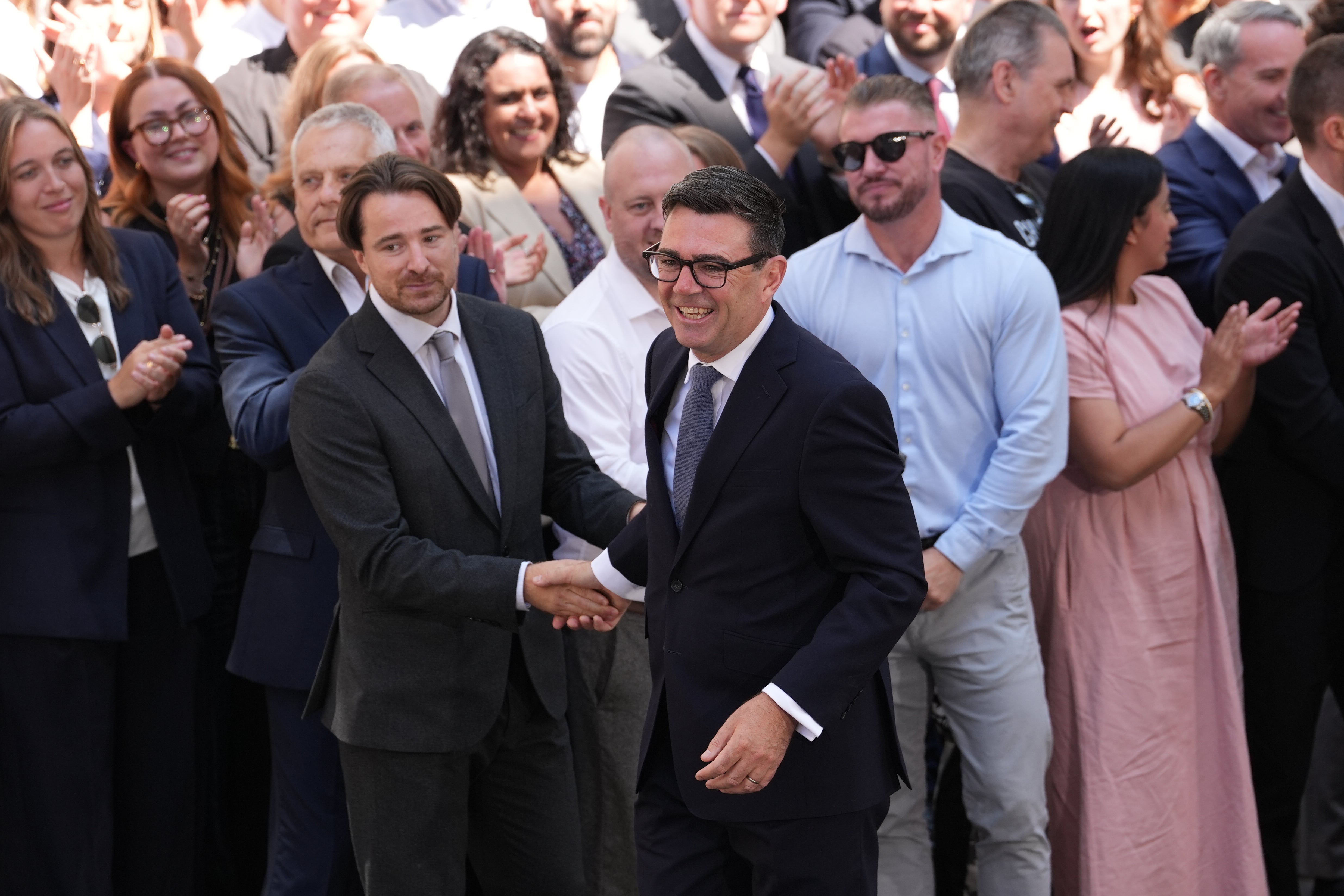 Andy Burnham with supporters outside 10 Downing Street (Gareth Fuller/PA) (PA Wire)
