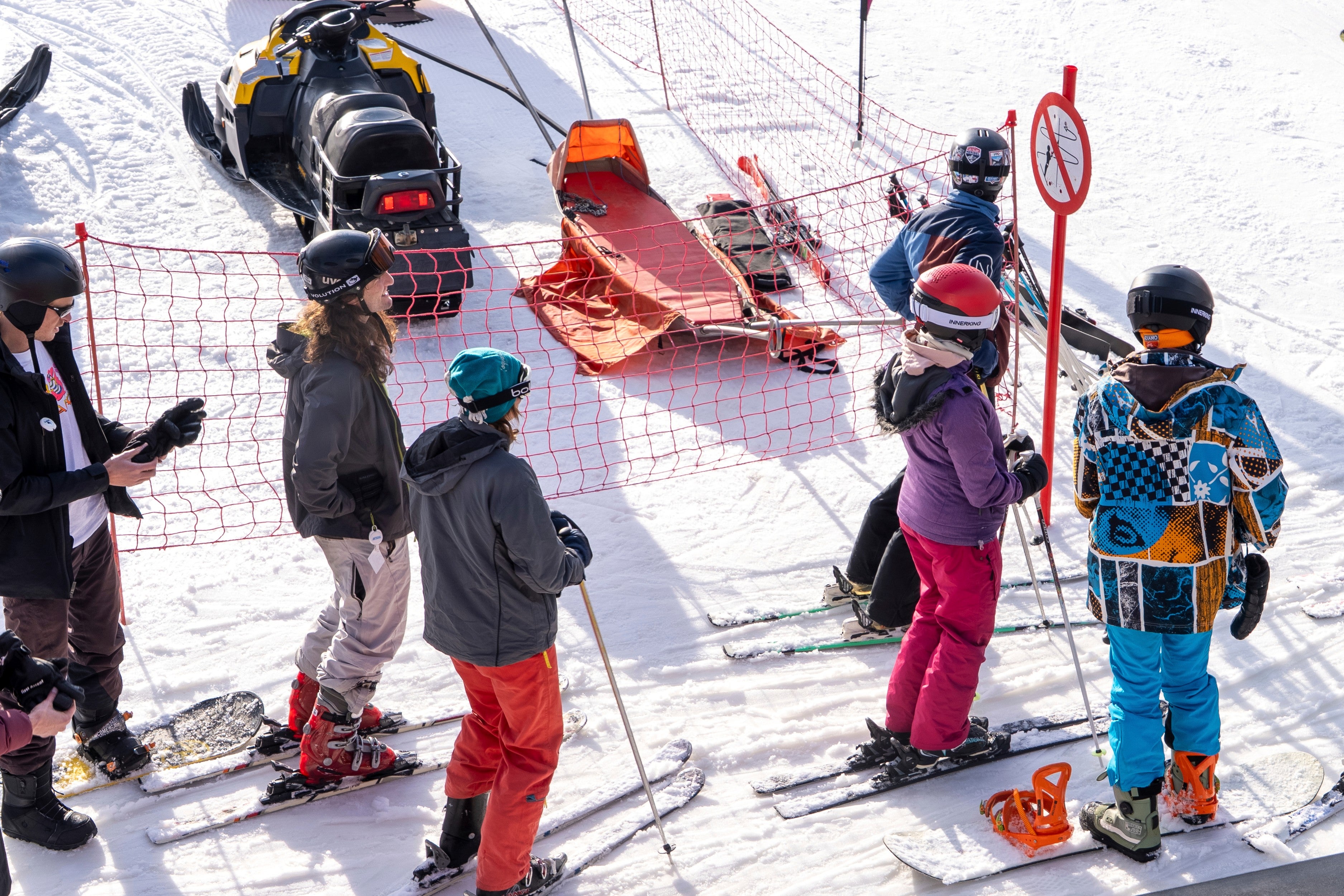 A group of skiers gather on the slopes at Afriski Mountain Resort