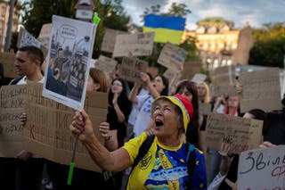People shout slogans during a protest demanding the reinstatement of Mykhailo Fedorov as defence minister and calling for the resignation of Commander in Chief of the Ukrainian Armed Forces Oleksandr Syrskyi in Kyiv